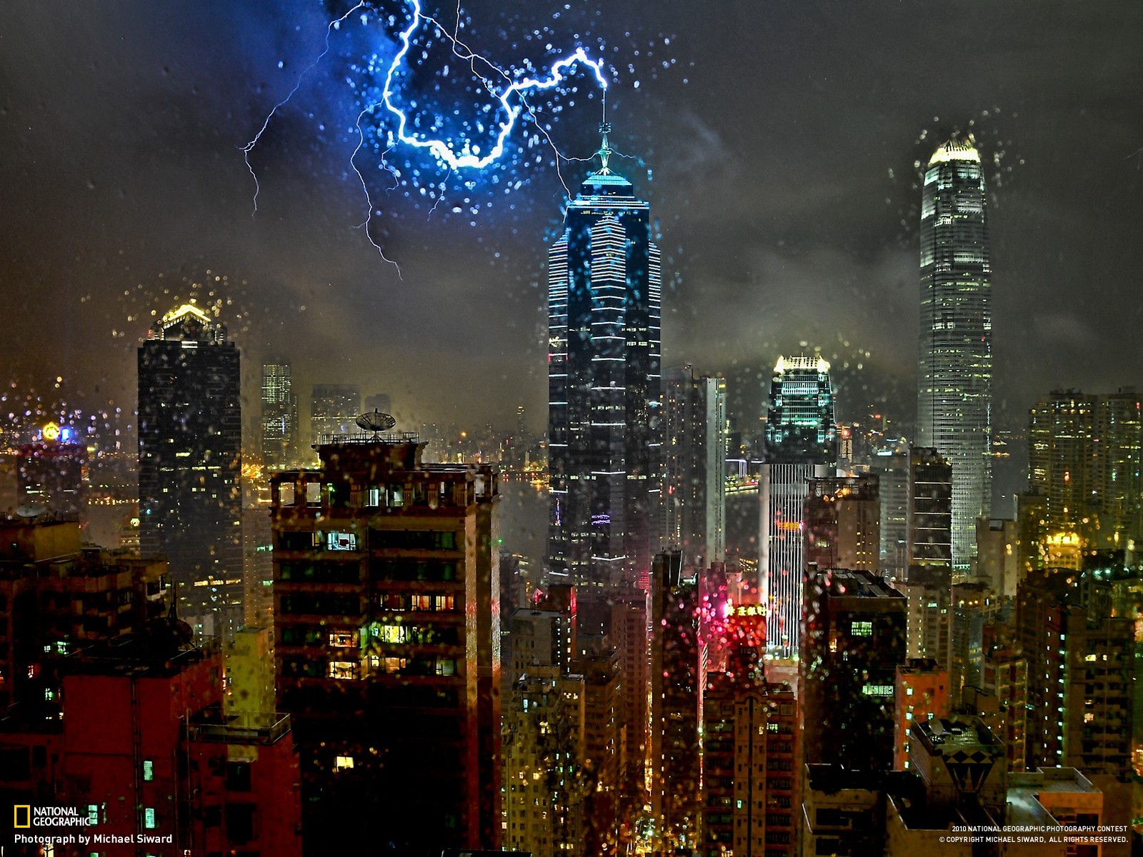 General 1600x1200 National Geographic skyscraper lightning storm Hong Kong city cityscape dusk China Asia rain 2010 (Year)