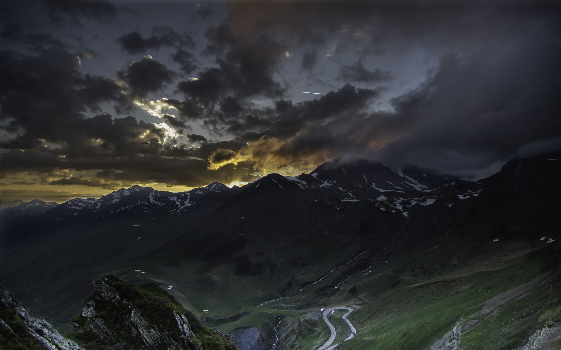 General 1920x1200 nature landscape valley sunset road mountains France clouds snowy peak dark low light hairpin turns