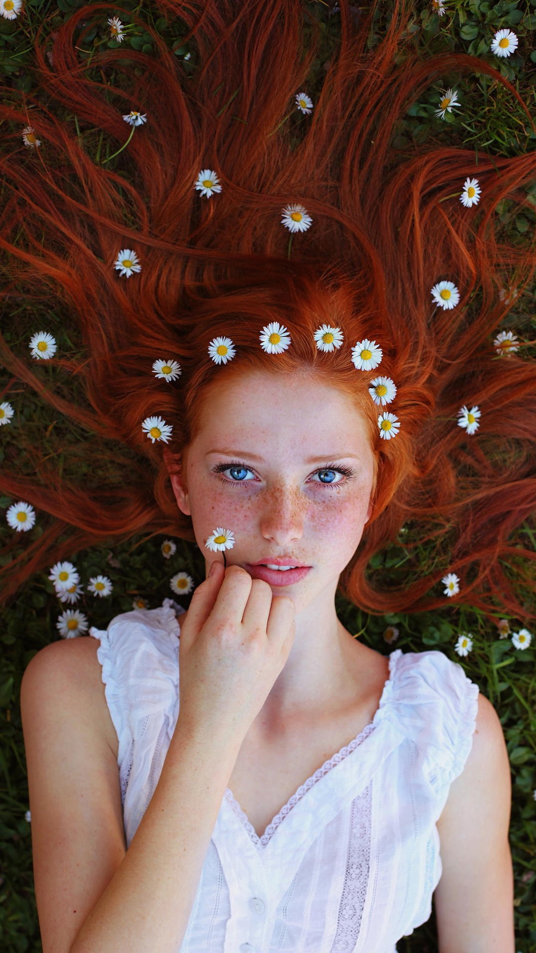 People 1080x1920 women model redhead face long hair women outdoors looking at viewer blue eyes freckles open mouth flowers white dress lying down grass