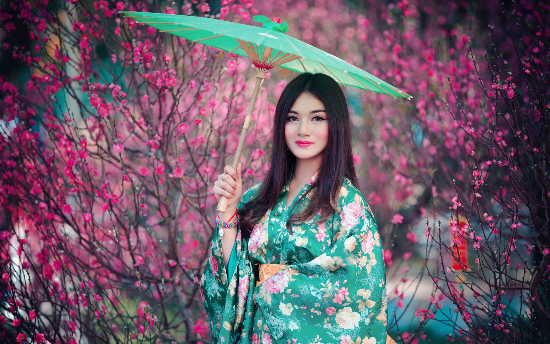 People 1920x1200 Asian women traditional clothing long hair brunette pink model umbrella women with umbrella makeup dark hair fantasy girl women outdoors looking at viewer plants outdoors Chinese