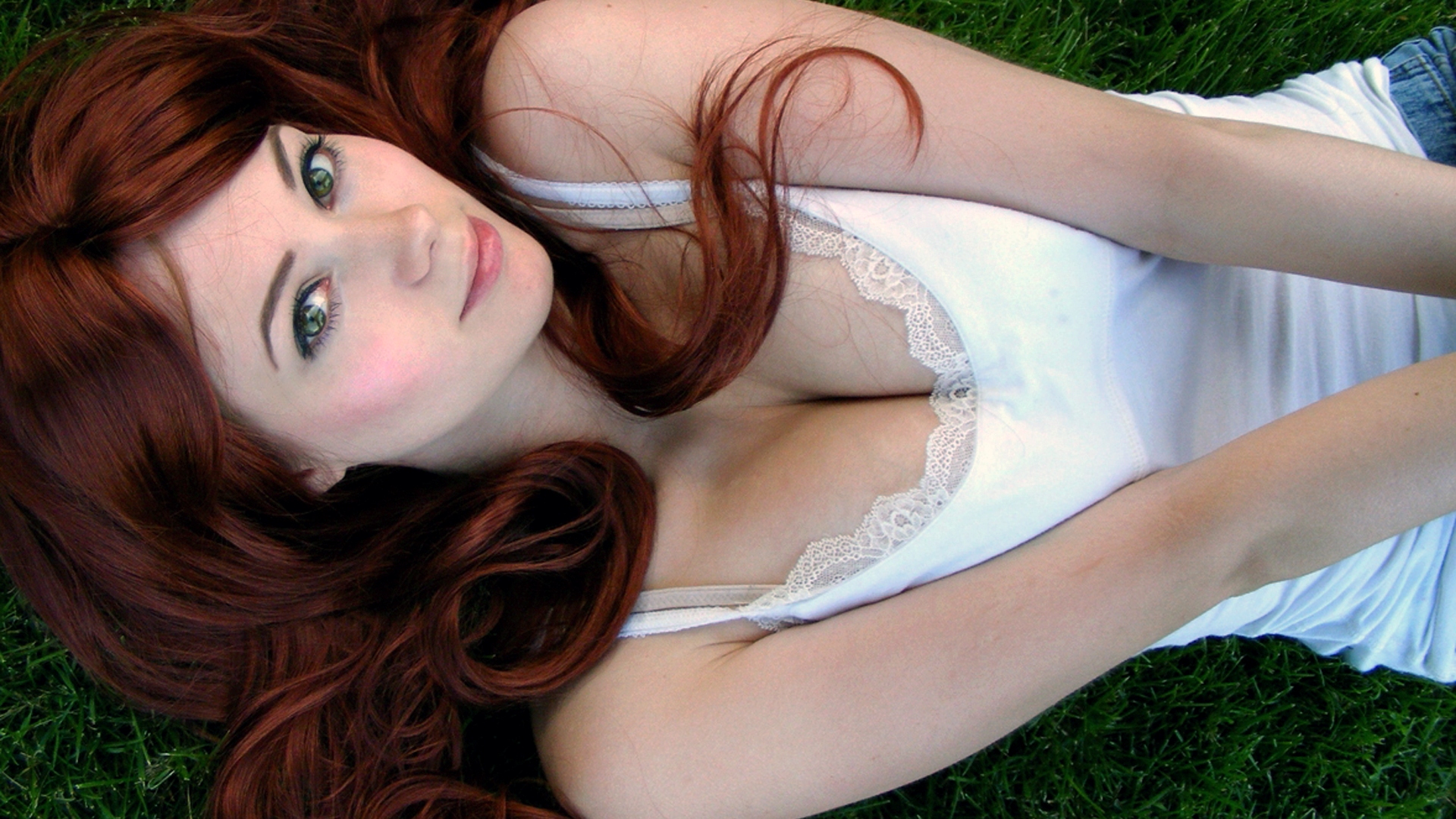 People 1920x1080 redhead green eyes women cleavage model face women outdoors dyed hair looking up grass outdoors lying on back smiling