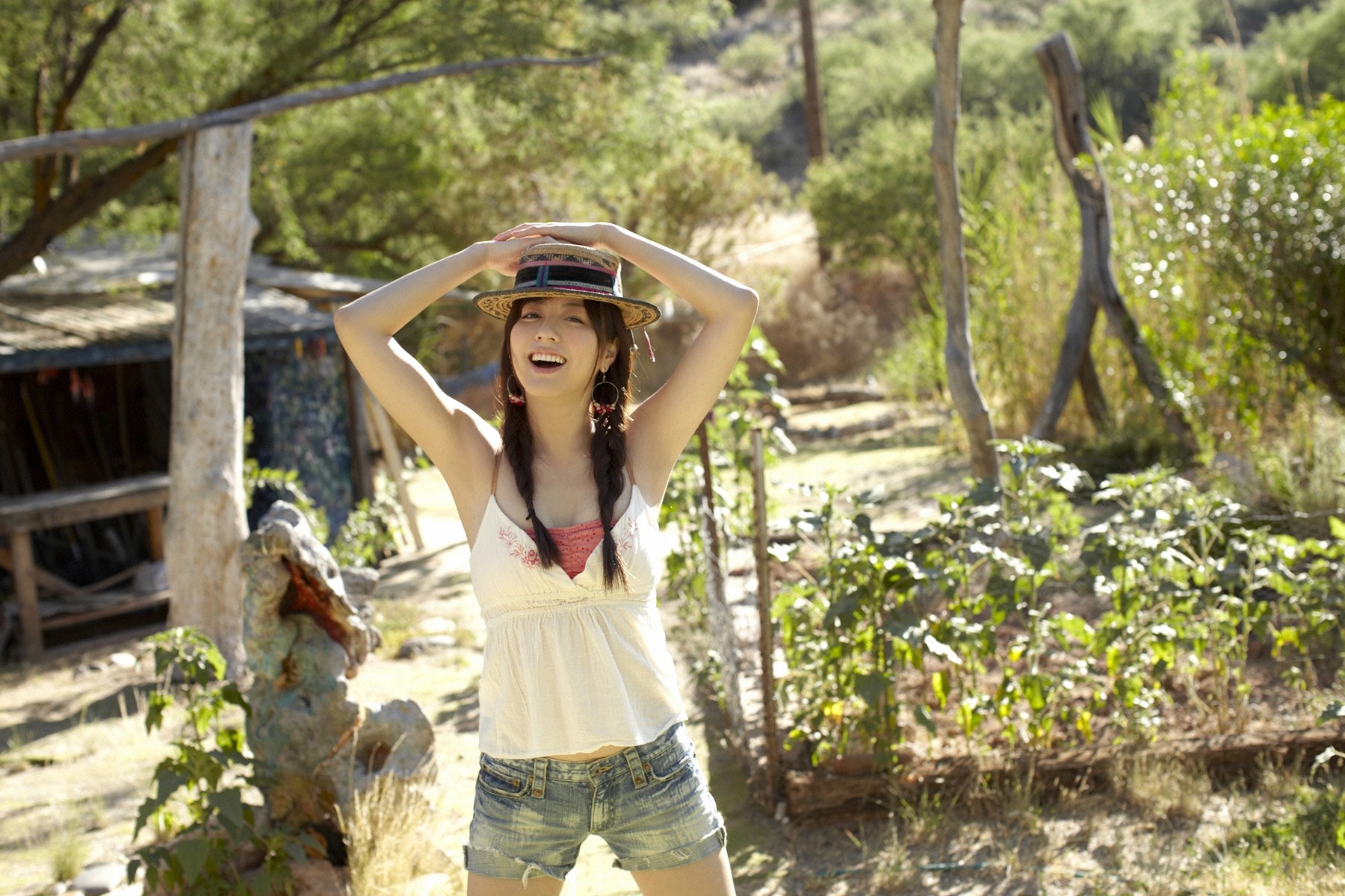 People 1800x1200 Asian women women outdoors jean shorts brunette open mouth millinery twintails standing looking at viewer outdoors arms up happy plants