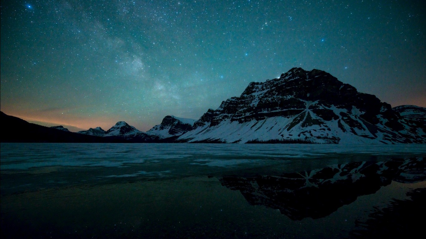General 1366x768 landscape mountains nature reflection frozen lake stars starred sky night Canada