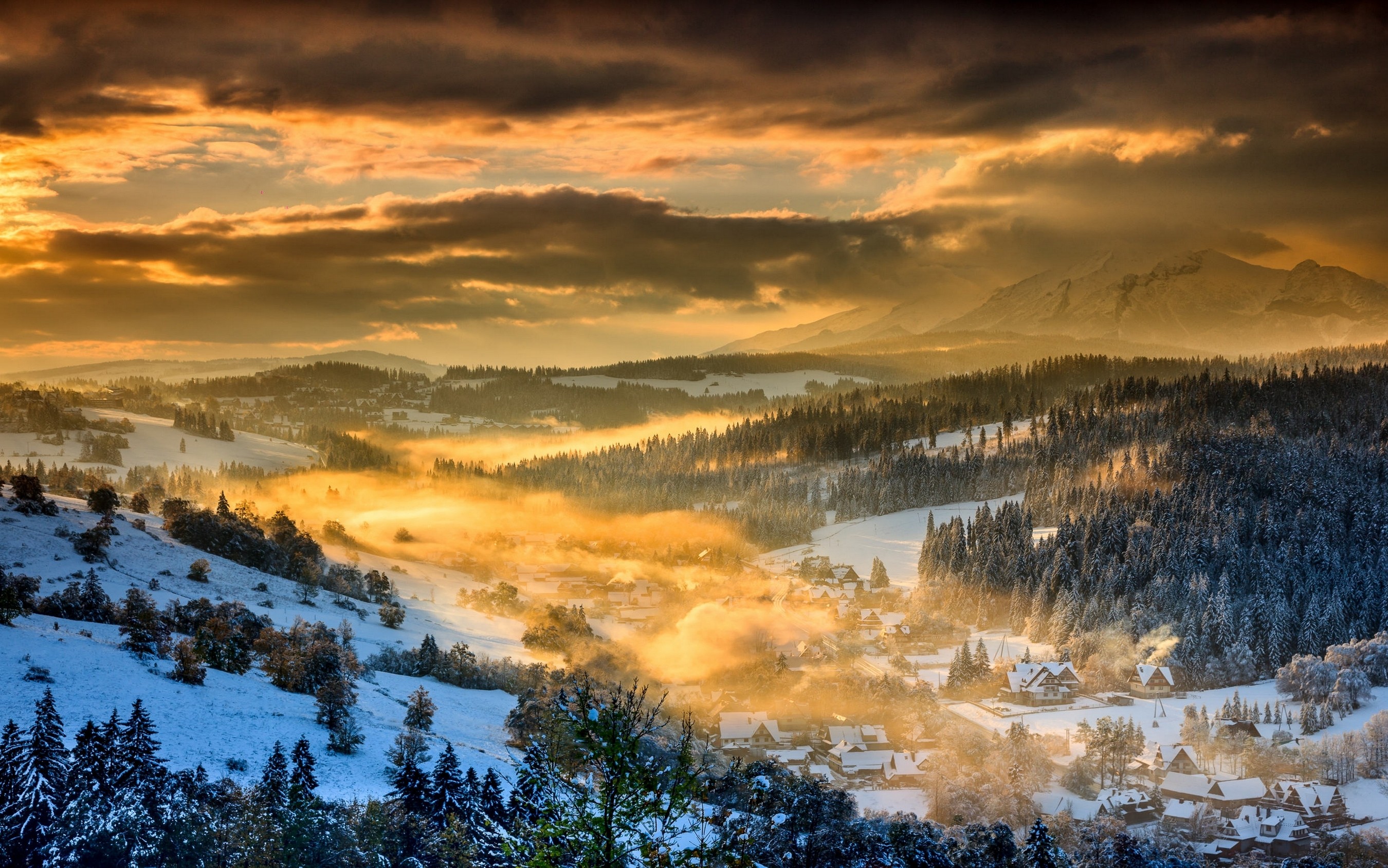 General 2700x1688 nature landscape winter sunset forest mountains clouds snow sky village Poland mist valley yellow
