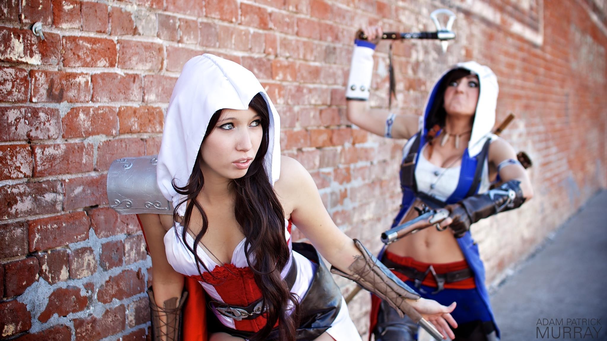 People 2048x1152 cosplay Assassin's Creed Jessica Nigri bricks Adam Patrick Murray two women hoods model video game girls women outdoors brunette fantasy girl women