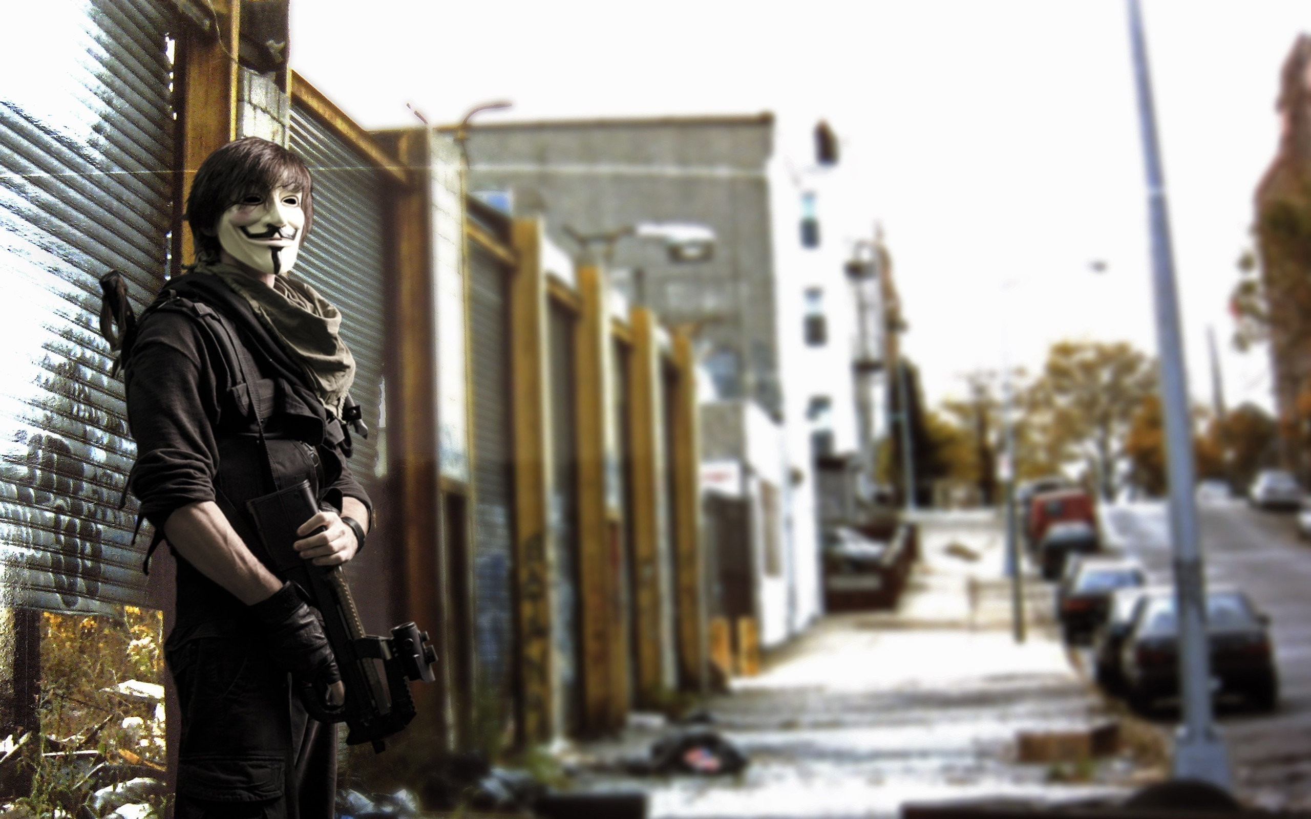People 2560x1600 FN P90 gun mask urban street Anonymous (hacker group) Guy Fawkes mask