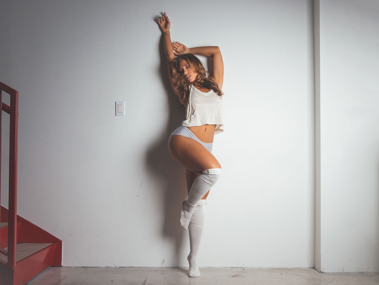 People 1330x1000 Nicole Mejia women white stockings tiptoe standing standing on one leg model brunette arms up armpits white tank top bare midriff women indoors closed eyes belly knee-highs