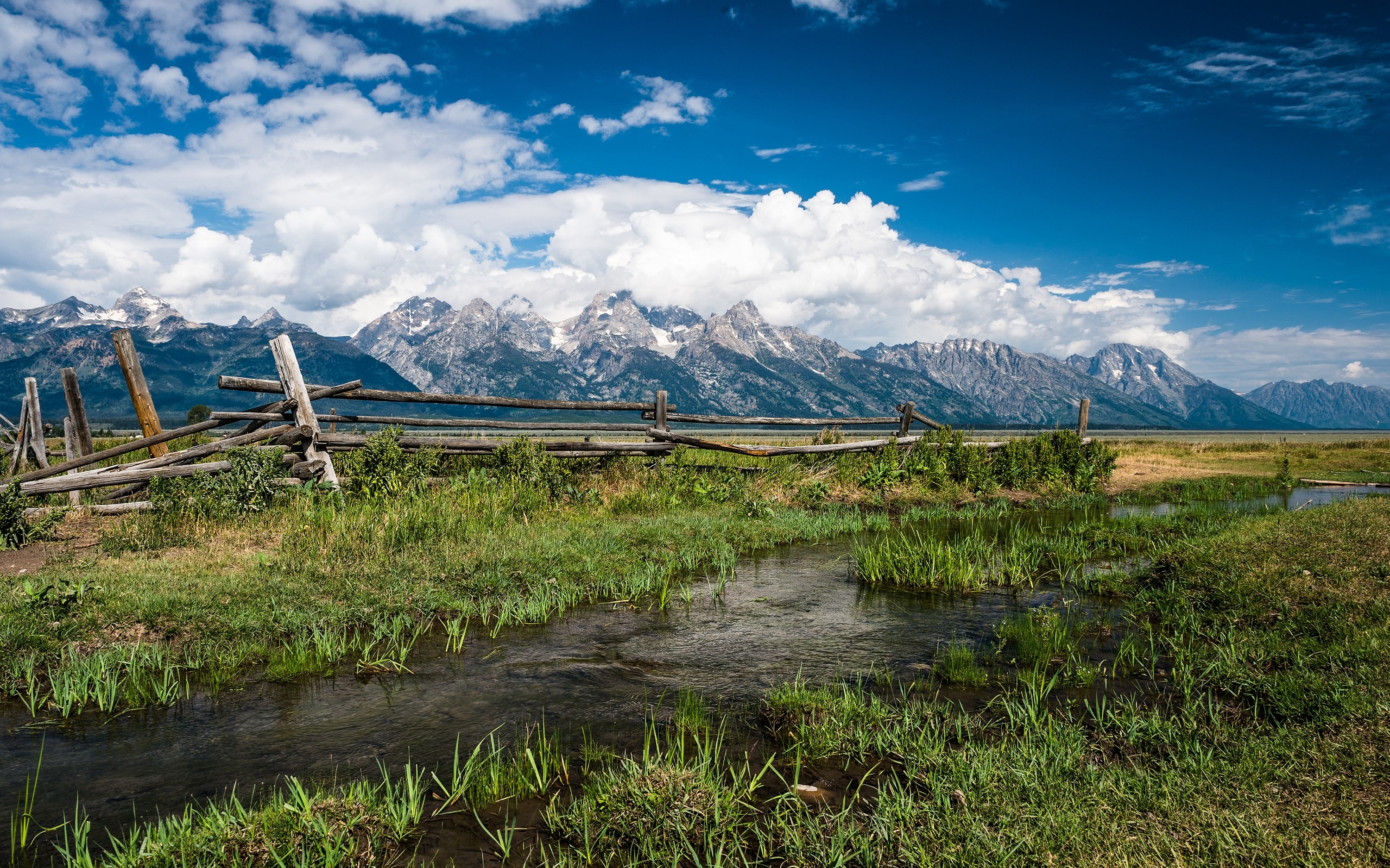General 3000x1875 nature landscape fence mountains grass creeks clouds Grand Teton National Park Wyoming USA sky water