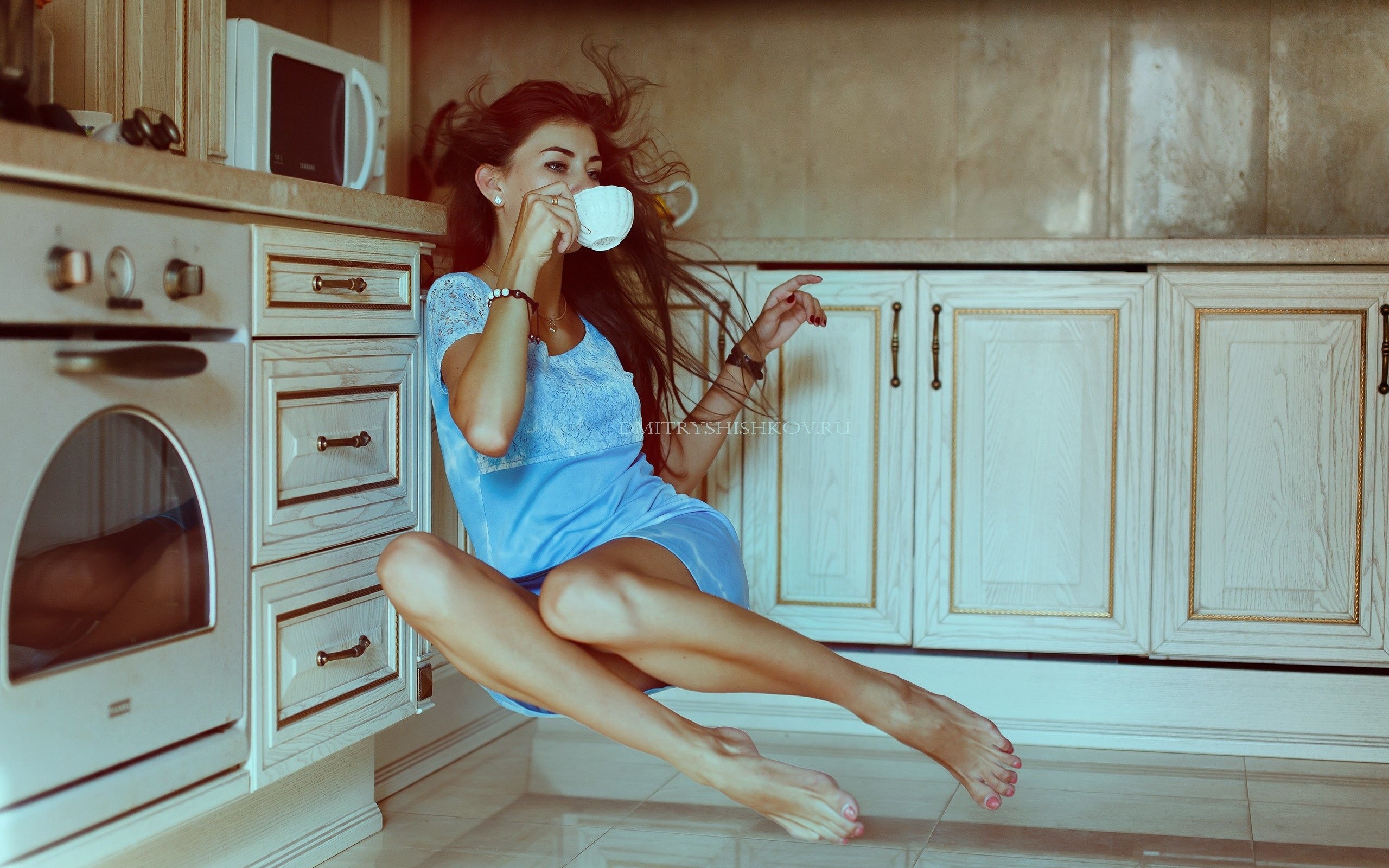 People 2560x1600 redhead kitchen women model floating legs legs together blue dress dress cup drinking women indoors indoors long hair