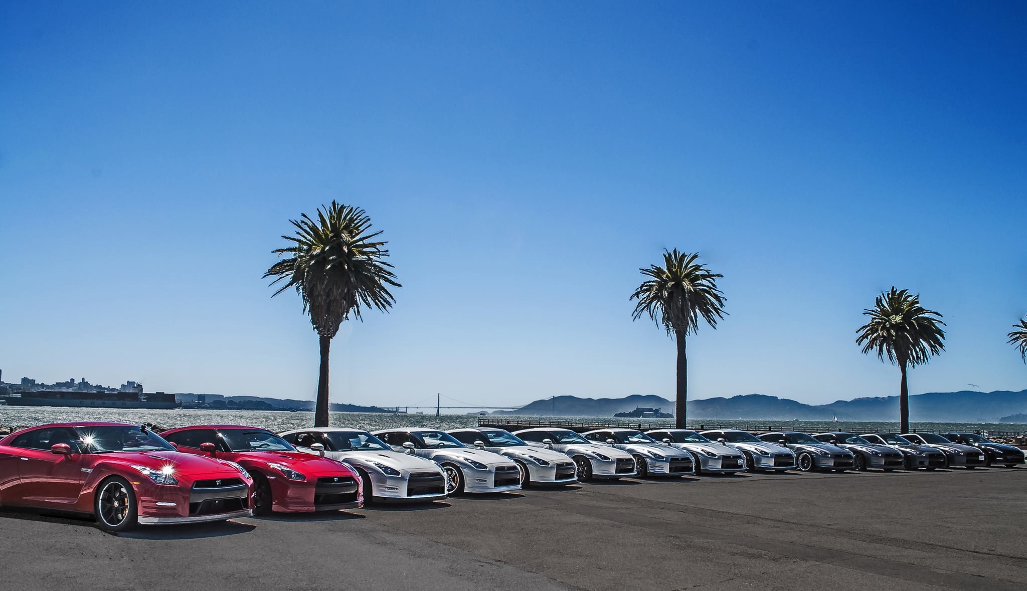 General 2048x1179 Nissan GT-R Nissan car palm trees red cars vehicle silver cars Japanese cars