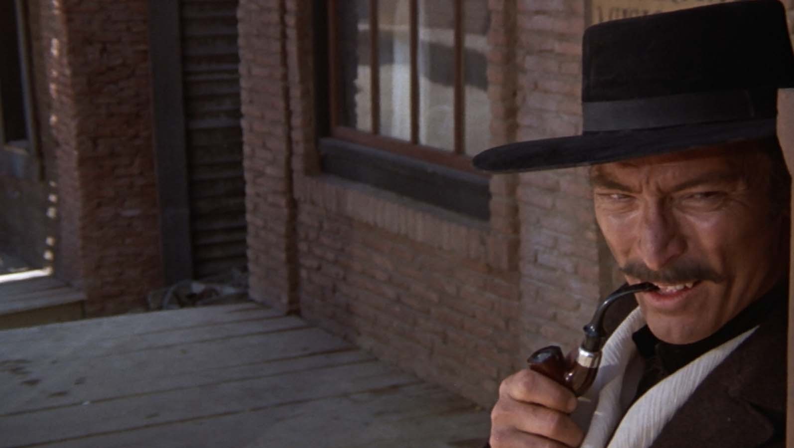 People 1594x900 movies The Good  The Bad and The Ugly Lee Van Cleef pipes smoking hat film stills men