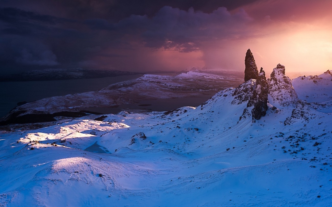 General 1300x812 nature landscape winter Old Man of Storr snow clouds sea island summit Scotland cold outdoors sky sunlight