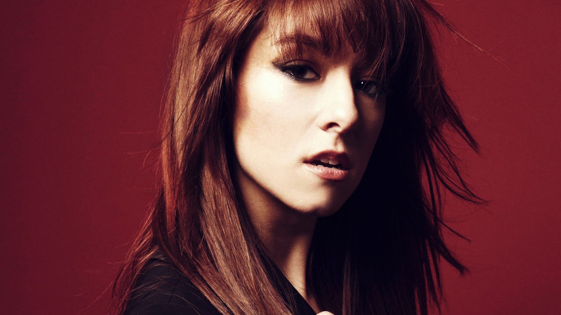 People 1920x1080 Christina Grimmie women auburn hair red background looking at viewer women indoors indoors long hair face studio