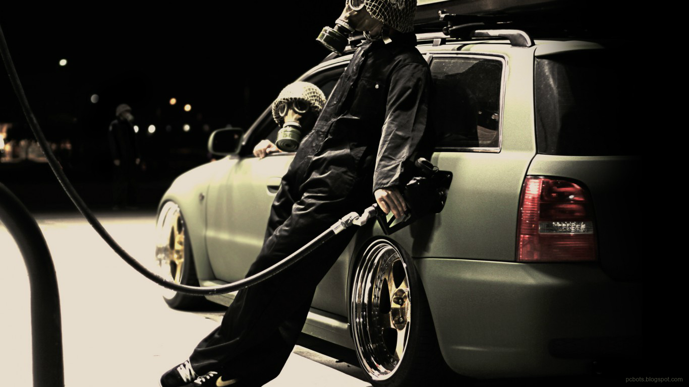 General 1366x768 Anonymous (hacker group) gas masks gas station low car tuning German cars Nike car vehicle station wagon