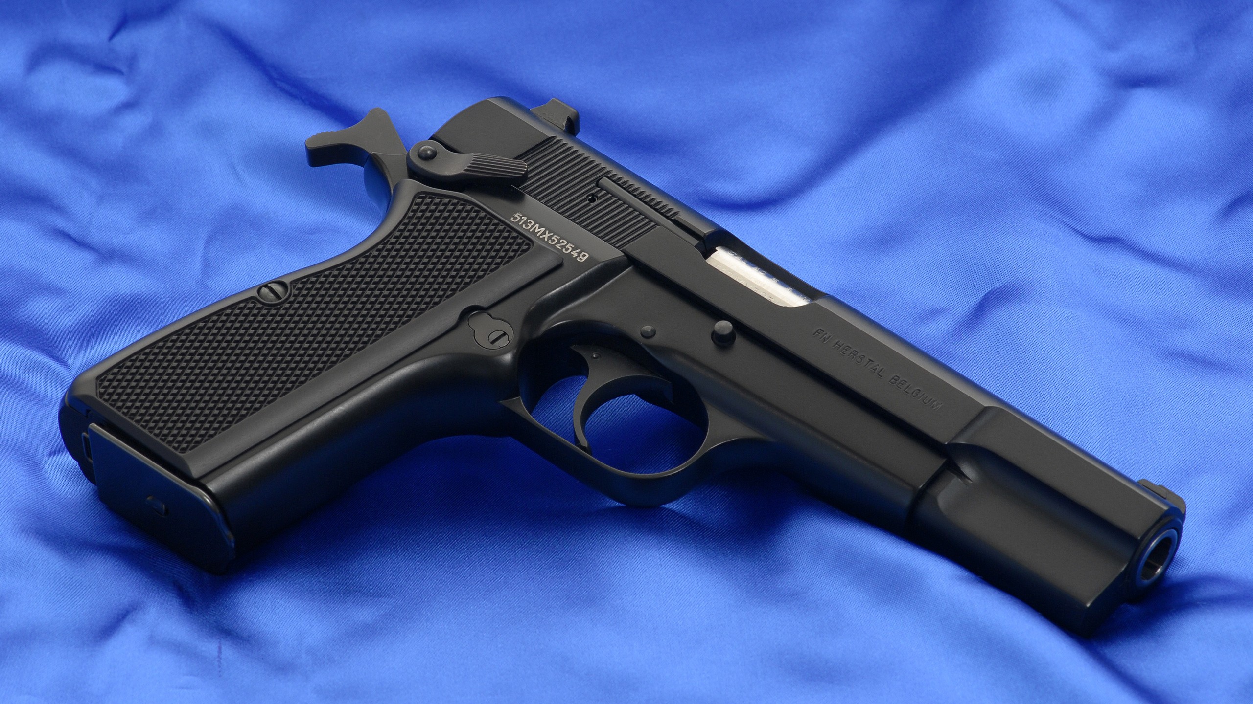 General 2560x1440 gun pistol weapon numbers FN Herstal Browning Hi-Power 9 mm blue background cloth blue black guns Belgian firearms