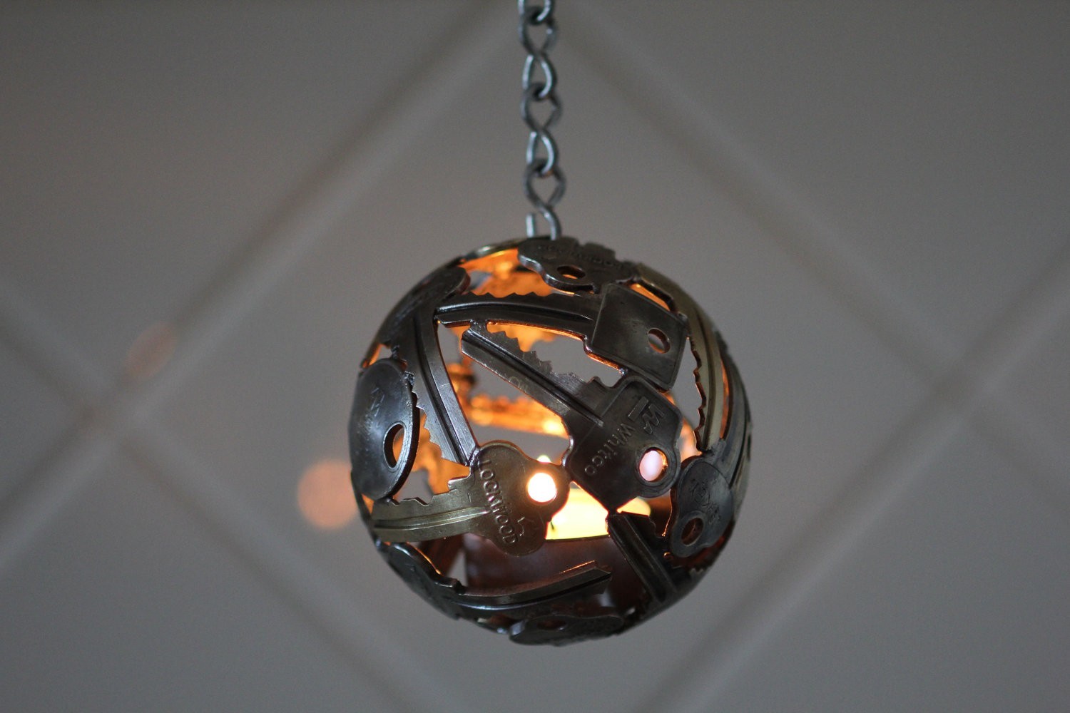 General 1500x1000 metal keys ball lights sphere artwork chains wall depth of field decorations candles
