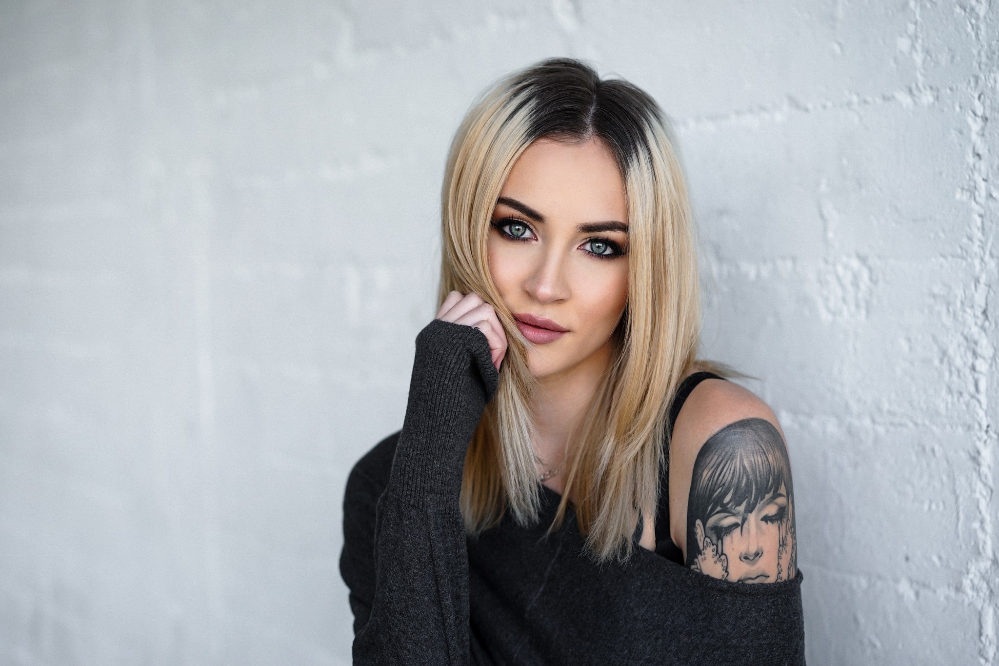 People 2048x1365 women model blonde bare shoulders face portrait tattoo wall Stephanie LeBlanc inked girls makeup looking at viewer women indoors indoors dyed hair sweater simple background