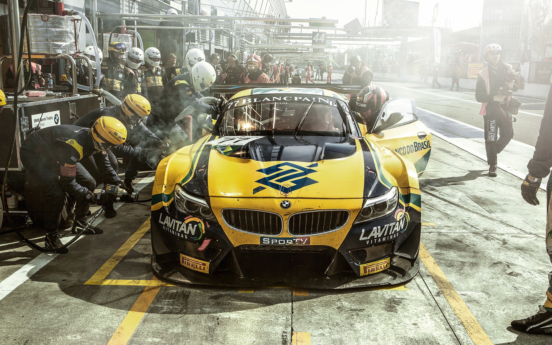 General 1920x1200 racing Team Brazil BMW car Pit stop race cars BMW Z4 frontal view motorsport sport vehicle yellow cars livery German cars