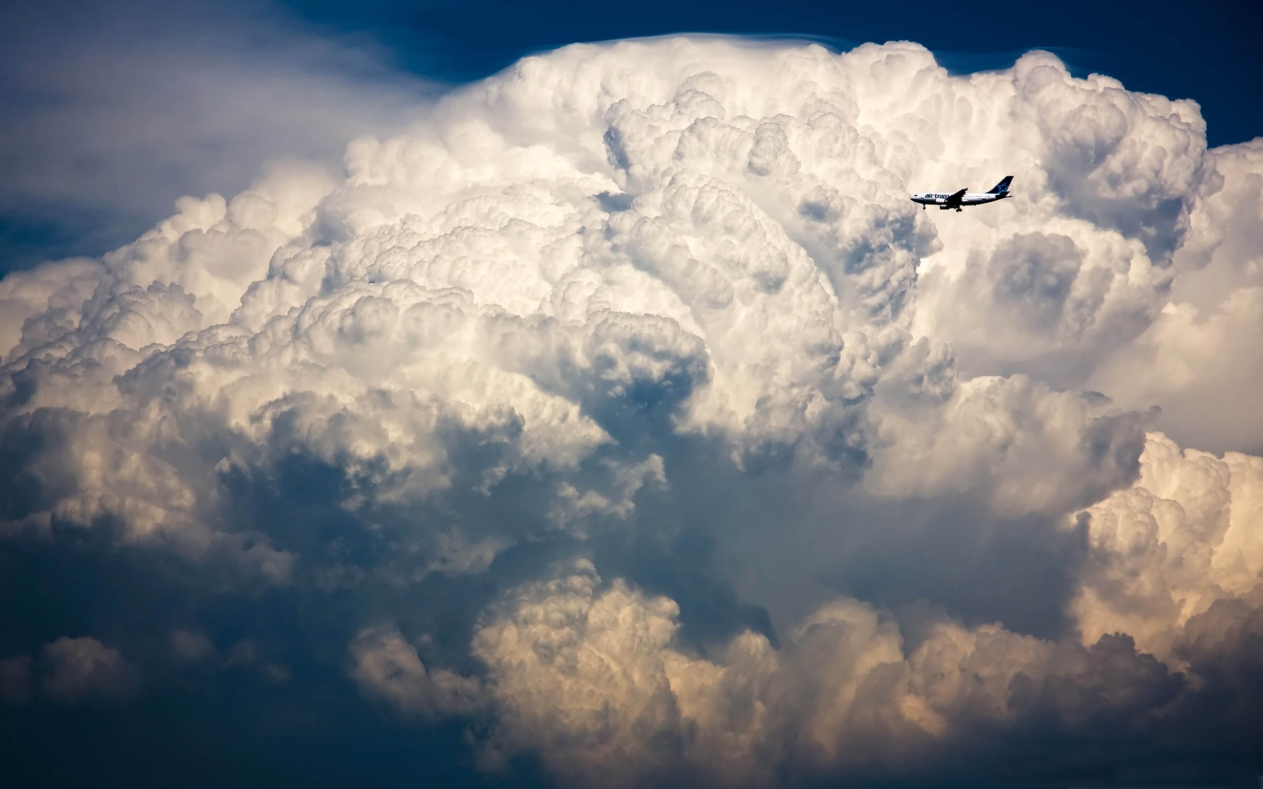 General 2560x1600 clouds airplane sky aircraft nature vehicle