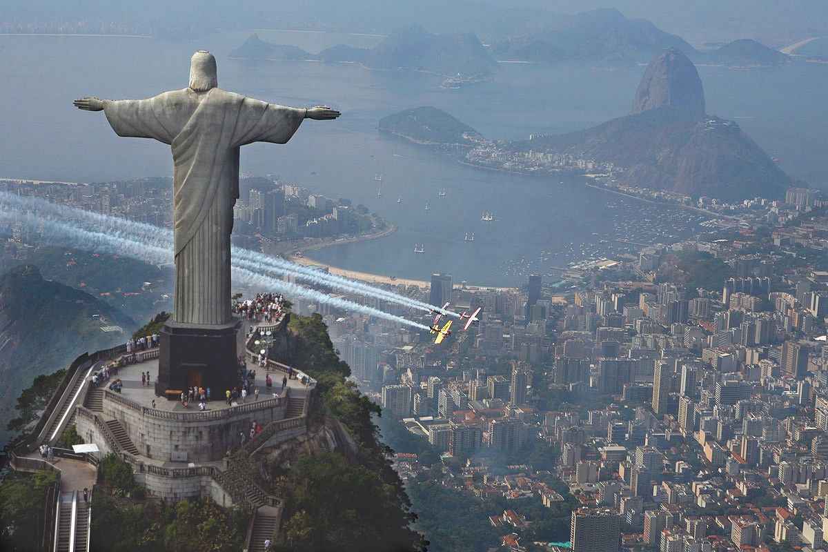 General 1200x800 Rio de Janeiro statue Christ the Redeemer contrails aerial view cityscape aircraft landmark South America
