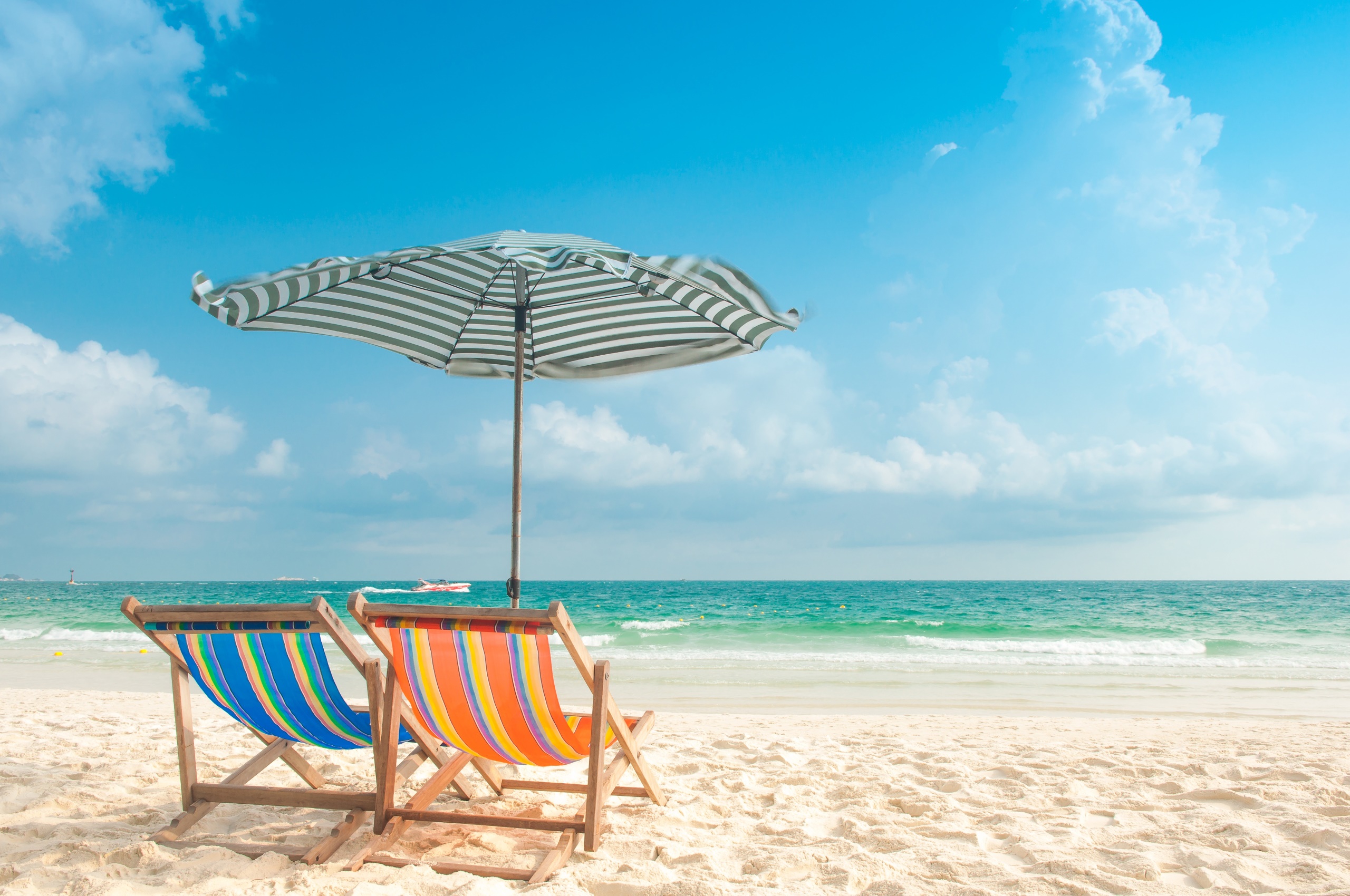 General 2560x1700 outdoors beach sea sky horizon deck chairs umbrella