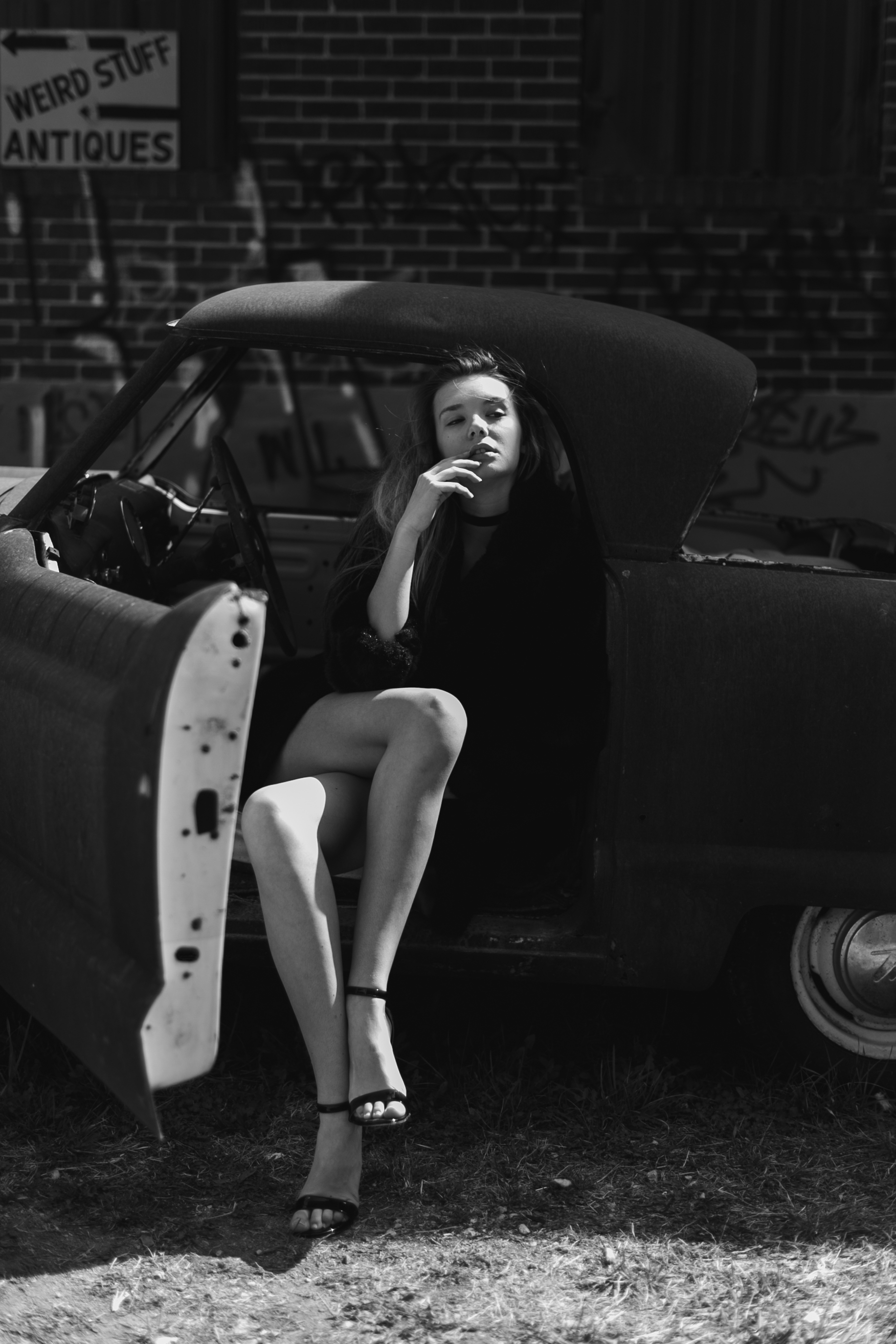 People 1832x2748 Morgan Fletchall model monochrome Clint Robert looking away heels sitting women car