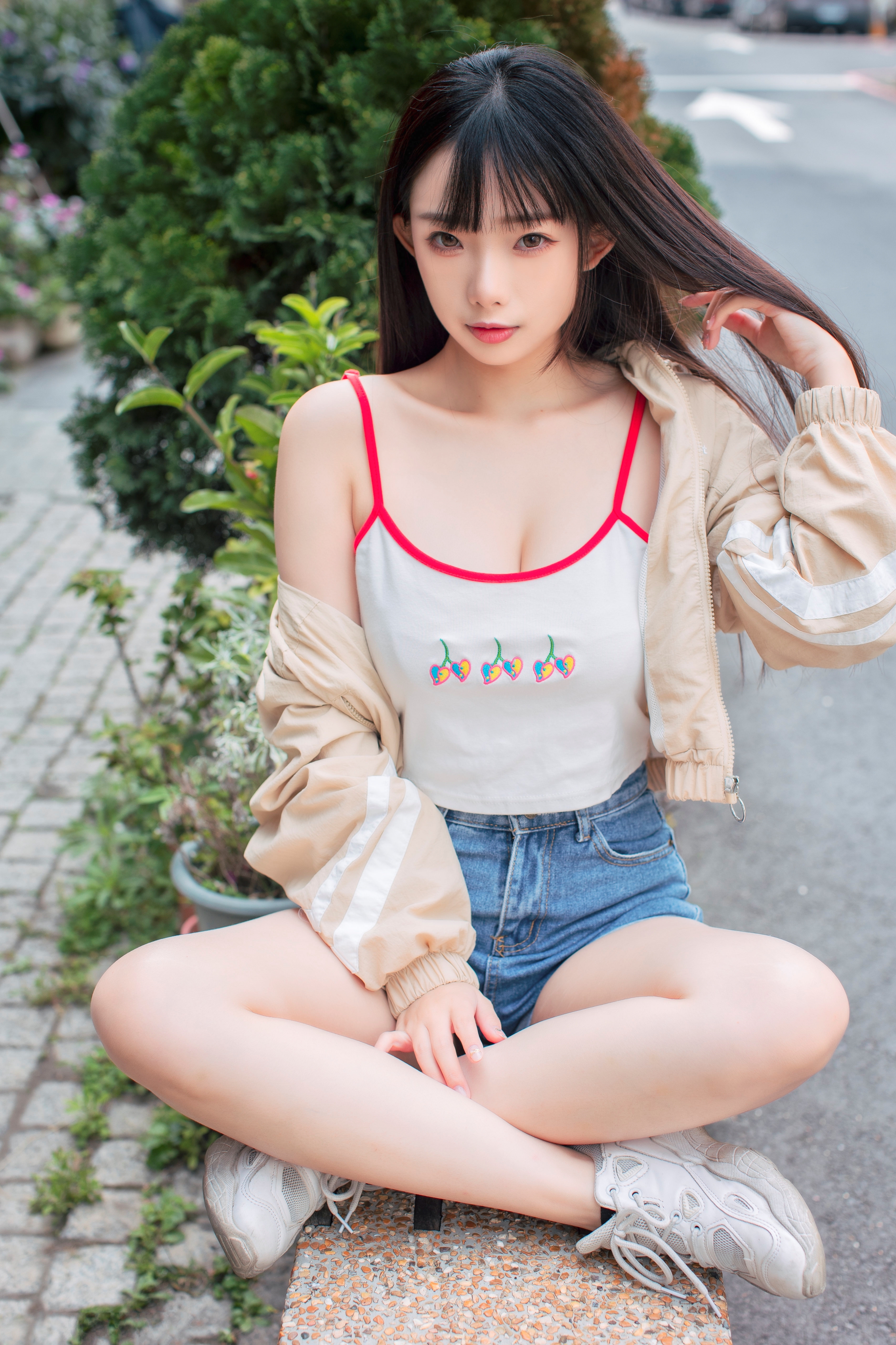 People 2560x3840 Ning Shioulin women model Asian brunette bangs looking at viewer portrait display cleavage white tops jean shorts sitting legs crossed sneakers outdoors women outdoors
