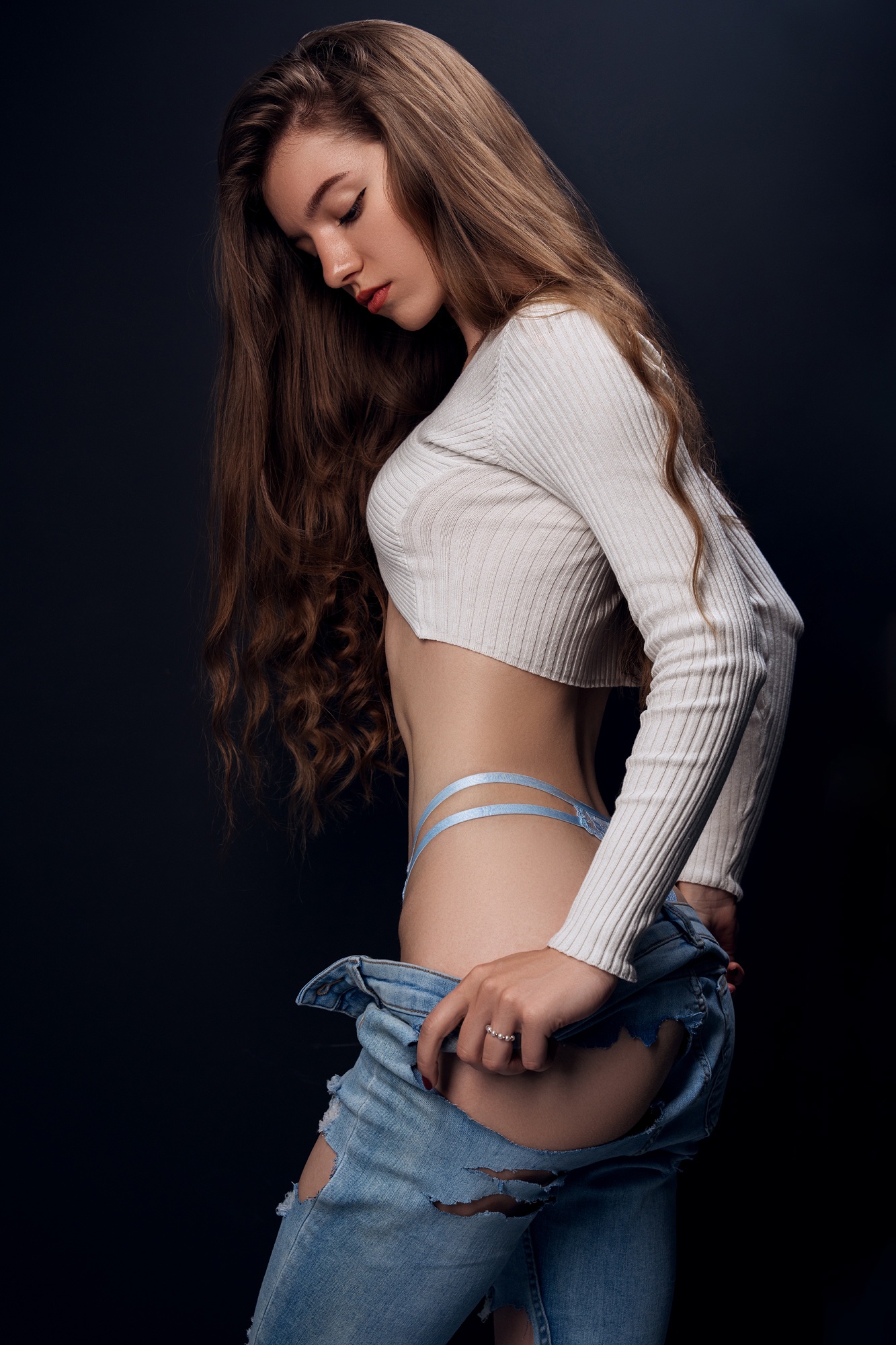 People 1333x2000 Andrey Zhukov women brunette undressing torn jeans simple background blue panties bare midriff long hair