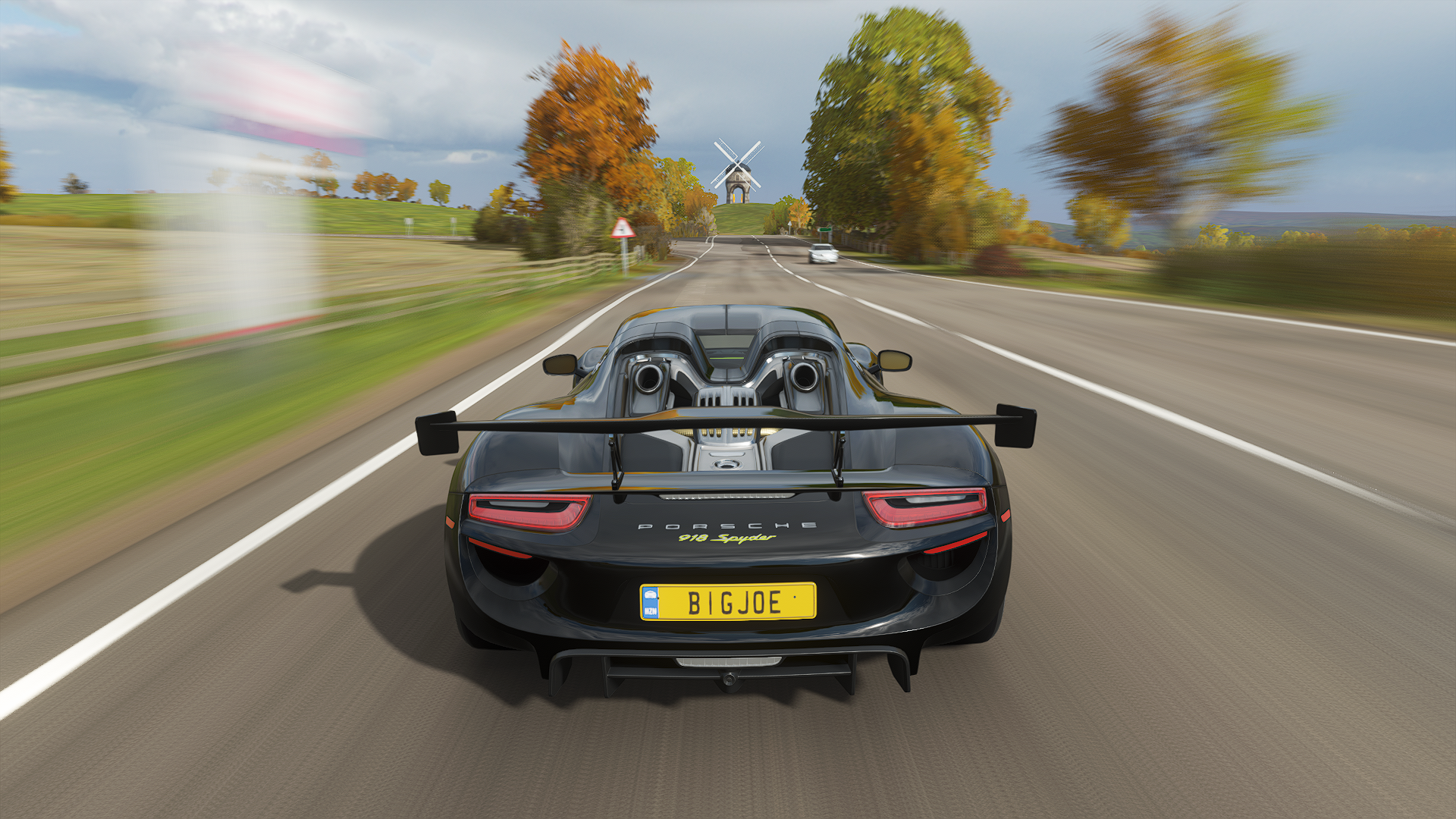 General 1920x1080 Forza Forza Horizon Forza Horizon 4 car racing Porsche 918 Spyder video games screen shot CGI rear view licence plates road blurred blurry background trees sky clouds