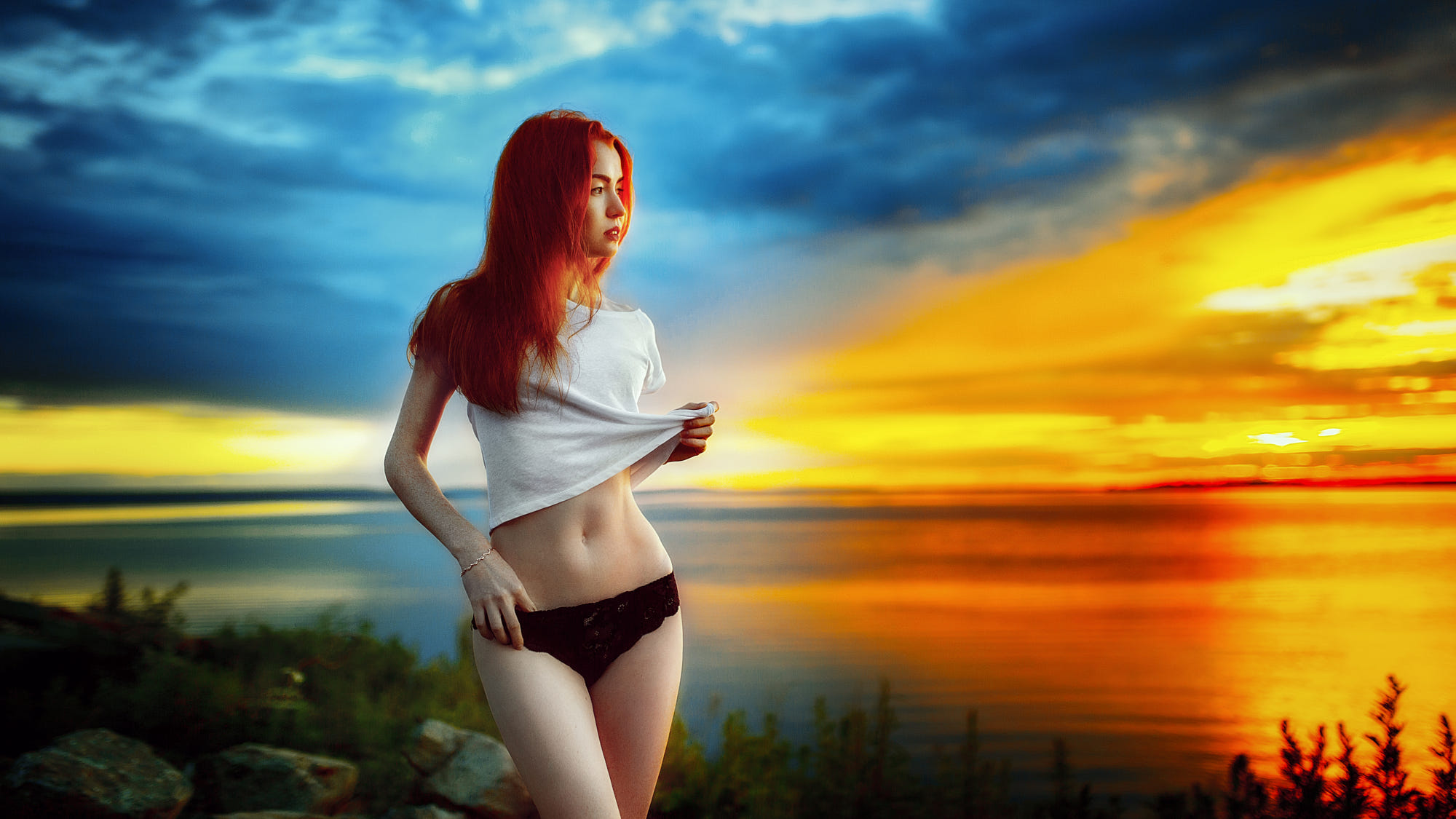 People 2000x1125 women redhead T-shirt black panties women outdoors sky long hair colorful pale hips belly standing Andrey Metelkov