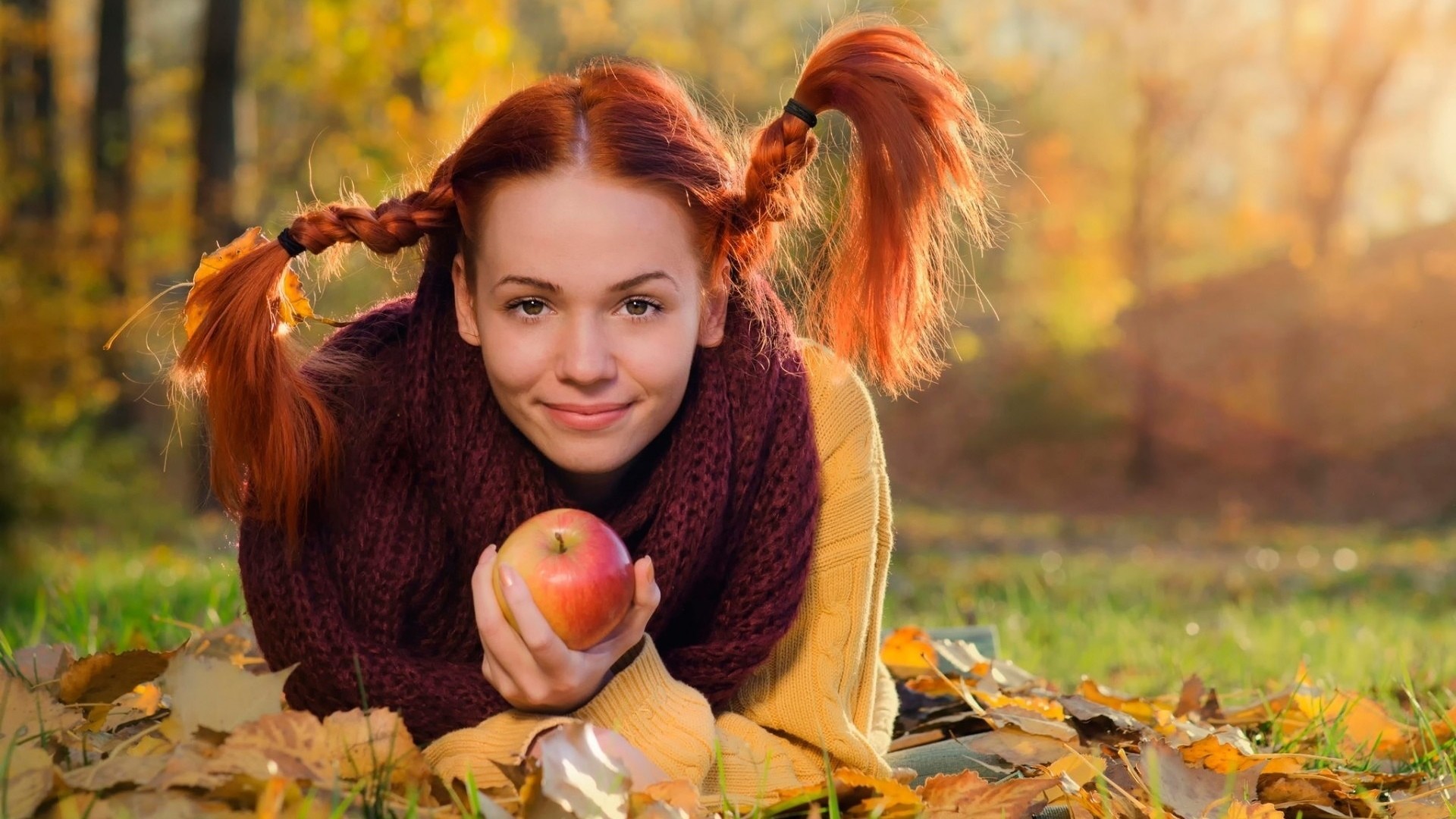 People 1920x1080 women model redhead long hair looking at viewer braids women outdoors smiling sweater scarf fruit apples nature fall leaves lying on front trees grass twintails