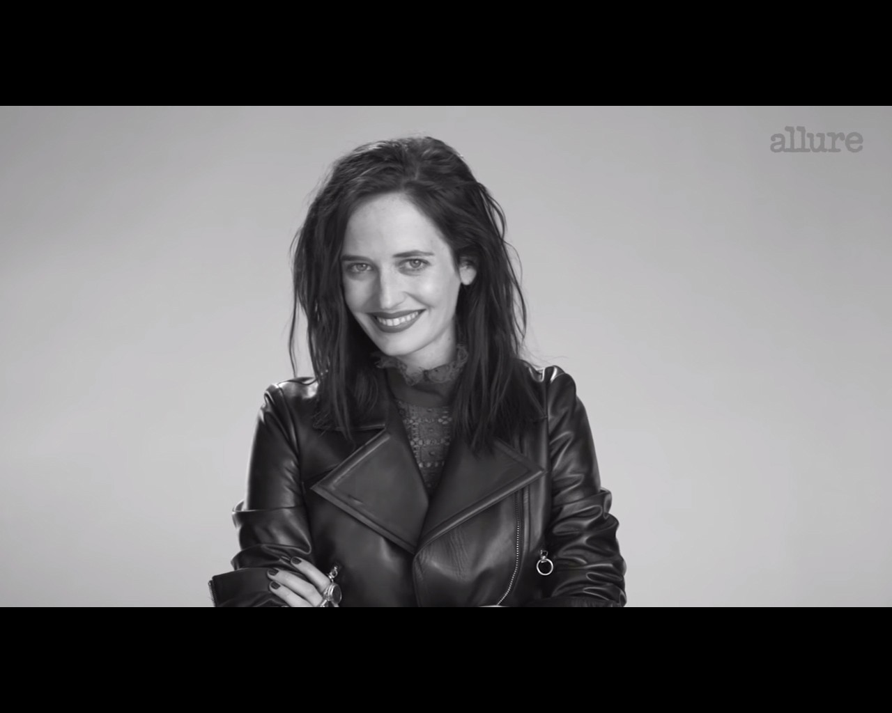 People 1280x1024 Eva Green women monochrome smiling leather jacket simple background studio looking at viewer women indoors indoors actress French women