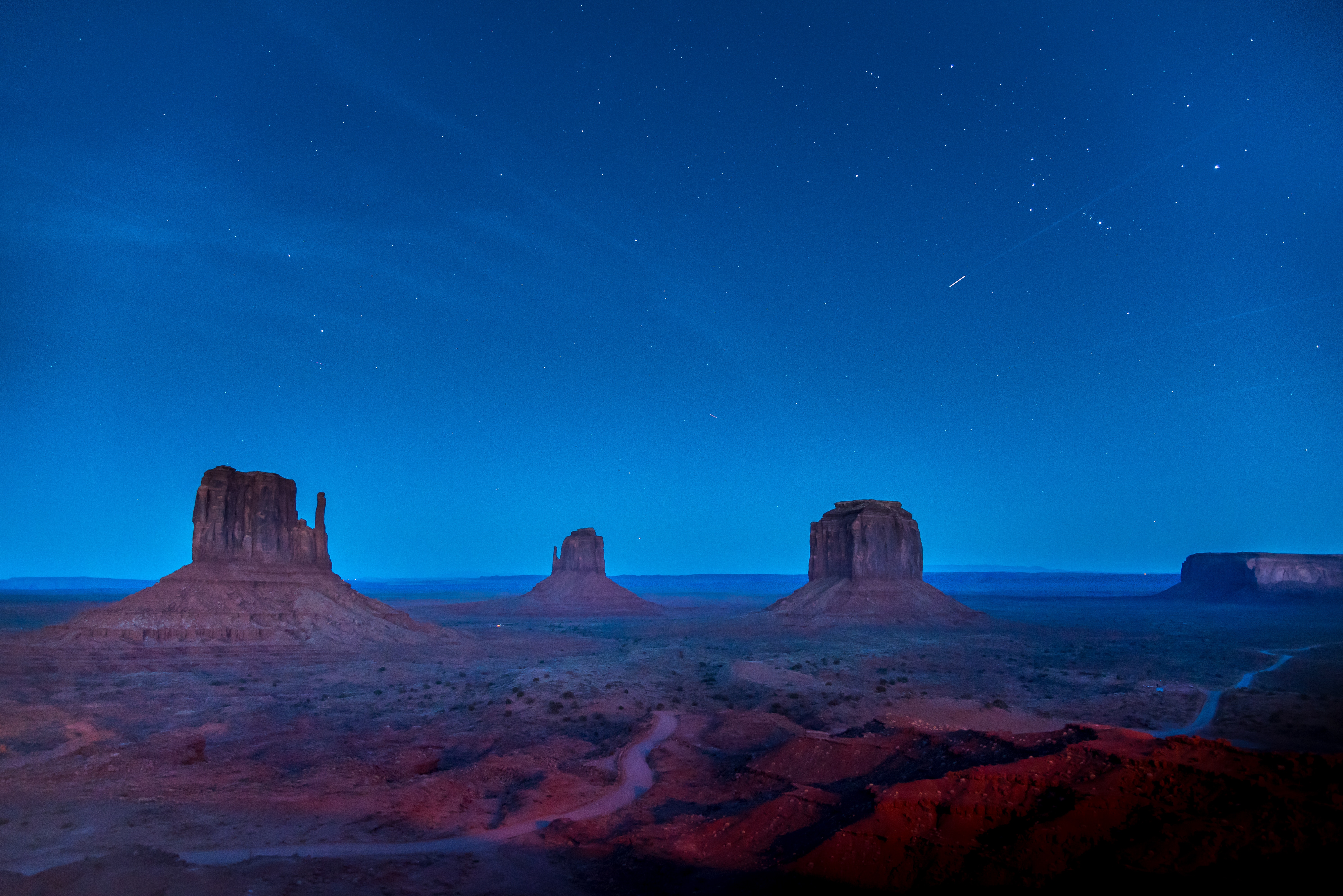 General 5976x3989 desert nature starry night USA stars night blue rock formation far view Monument Valley
