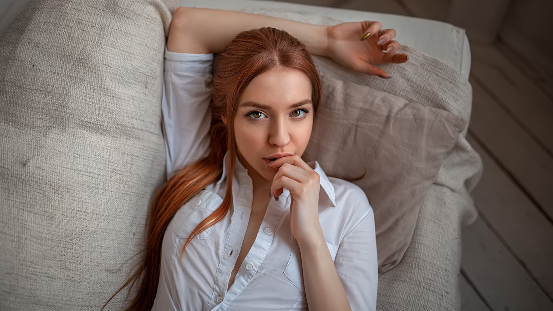 People 1920x1080 women face portrait redhead white shirt finger on lips painted nails long hair couch top view looking at viewer no bra cleavage