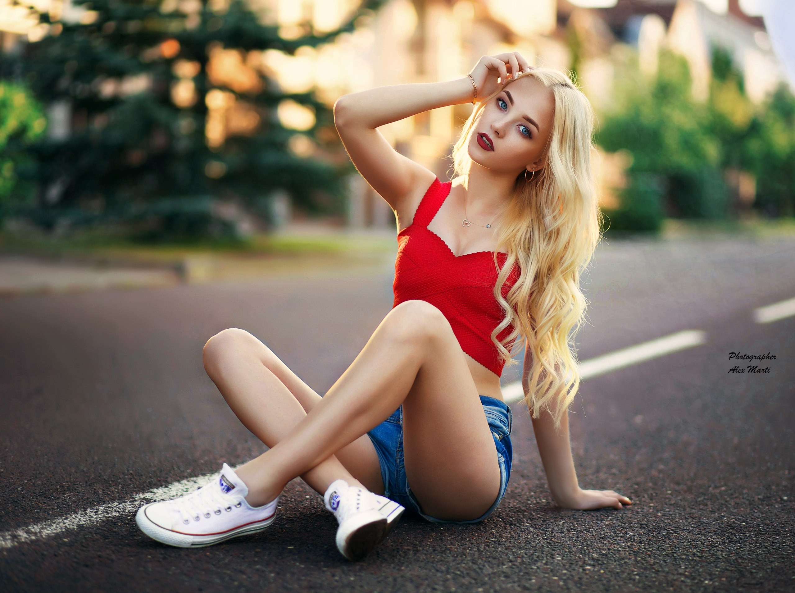 People 2560x1909 women model blonde sneakers sitting Converse jean shorts hands on head Uliana Verenchikova long hair wavy hair road Alex Marti women outdoors asphalt white shoes makeup looking at viewer heart necklace photoshopped thighs legs earring legs crossed