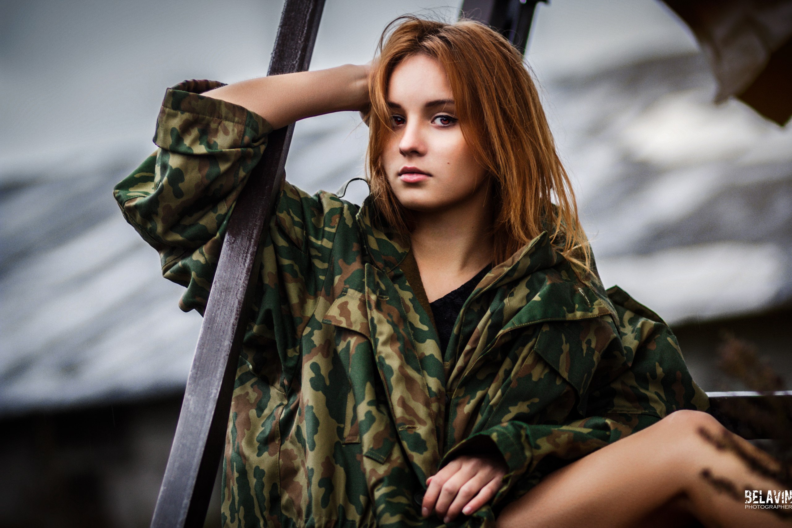 People 2560x1707 model women Alexander Belavin redhead face looking at viewer camouflage hands on head depth of field jacket closed mouth short hair touching hair arm behind head one arm up