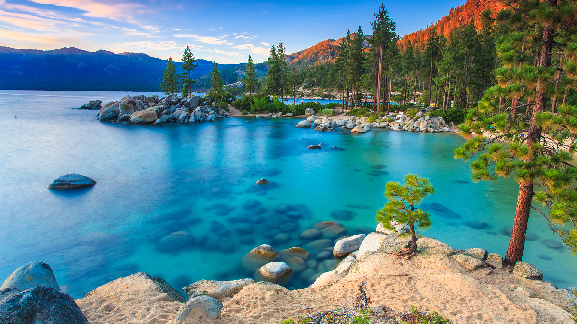 General 1920x1080 nature landscape far view water rocks mountains clouds sky trees sunrise clear water sand water ripples Lake Tahoe Nevada USA