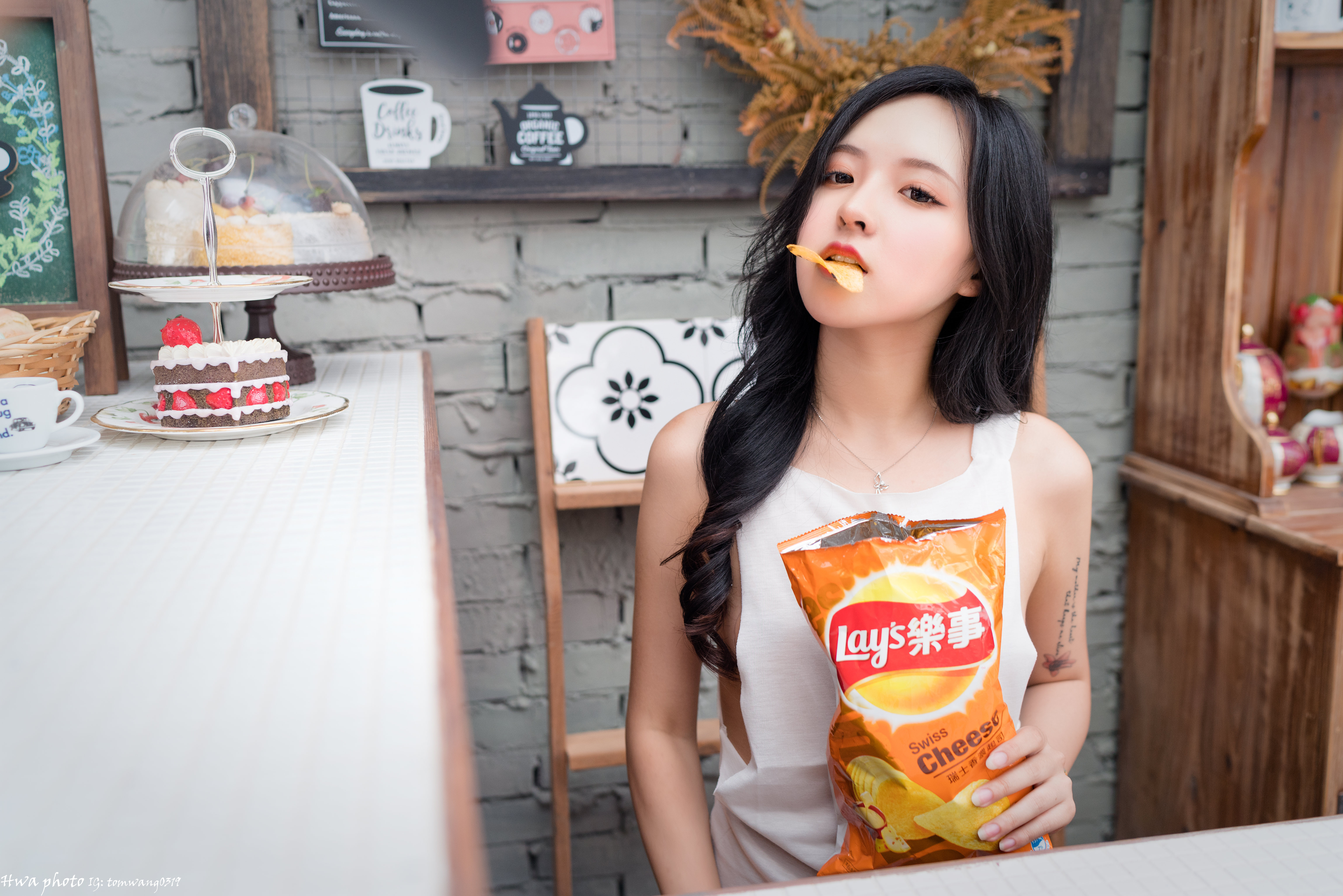 People 6144x4098 Asian women model long hair black hair eating potato chips cake cupboard signs sitting table snacks