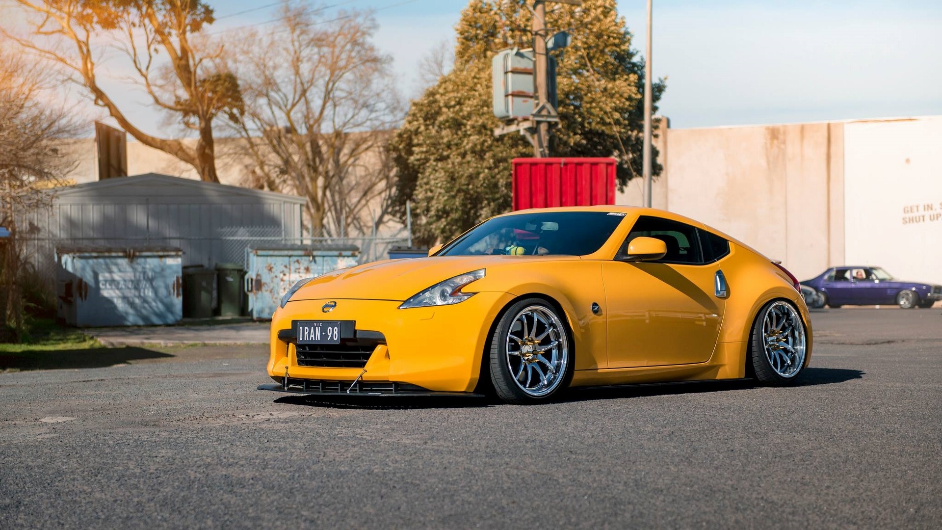 General 1920x1080 Nissan 370Z Nissan Japanese cars yellow cars orange cars sports car car vehicle trees Nissan Fairlady Z frontal view outdoors Nissan 350Z