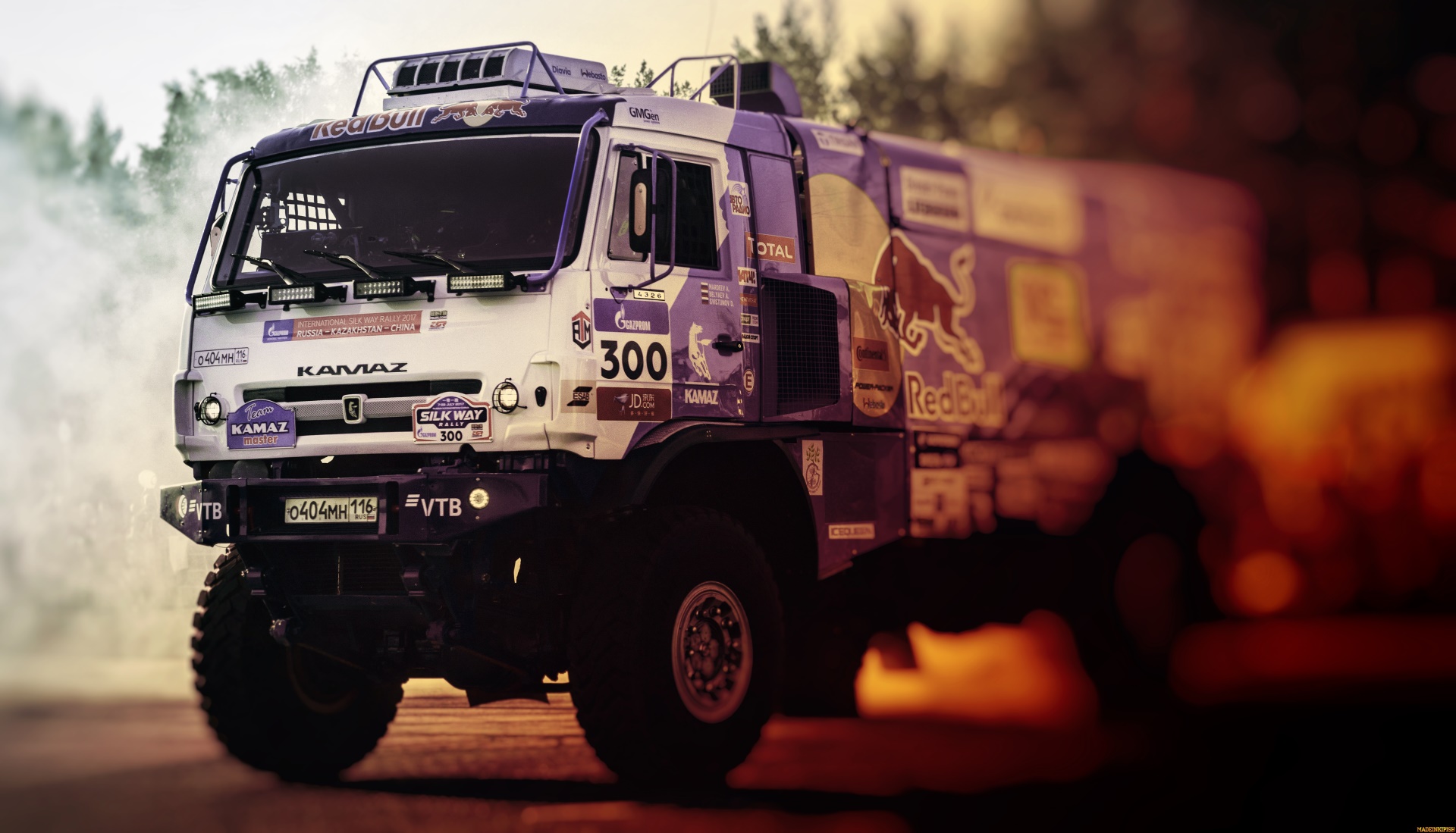 General 1920x1099 Rally racing vehicle Kamaz livery truck frontal view watermarked Russian trucks