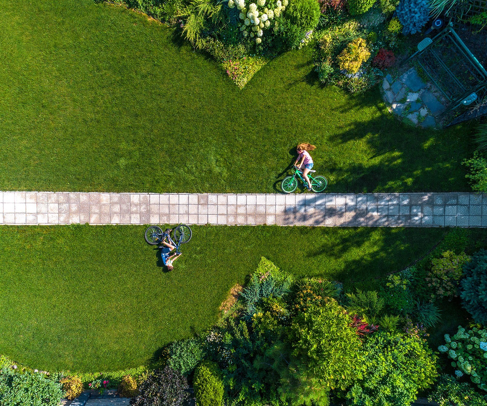 General 1600x1336 photography aerial view nature landscape children bicycle path humor trees grass garden tiles lawns shadow lying on side