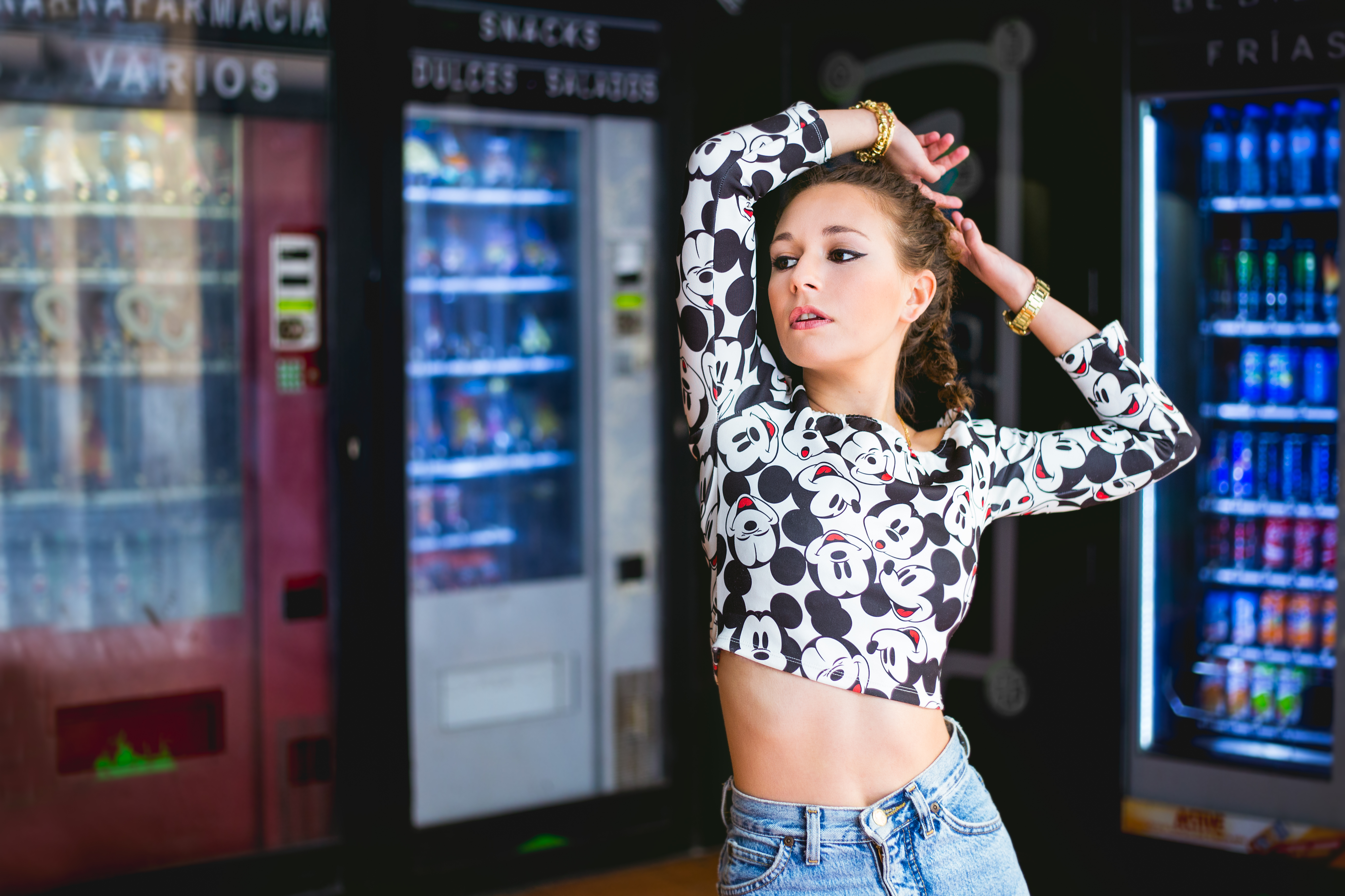 People 5235x3490 brunette brown eyes jeans denim arms up open mouth Mickey Mouse bangles vending machine women belly