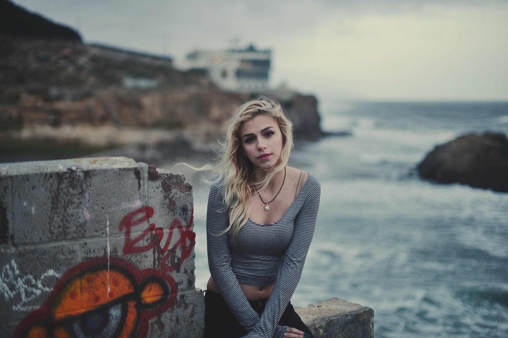 People 2048x1365 women blonde looking at viewer windy sitting water women outdoors graffiti striped clothing