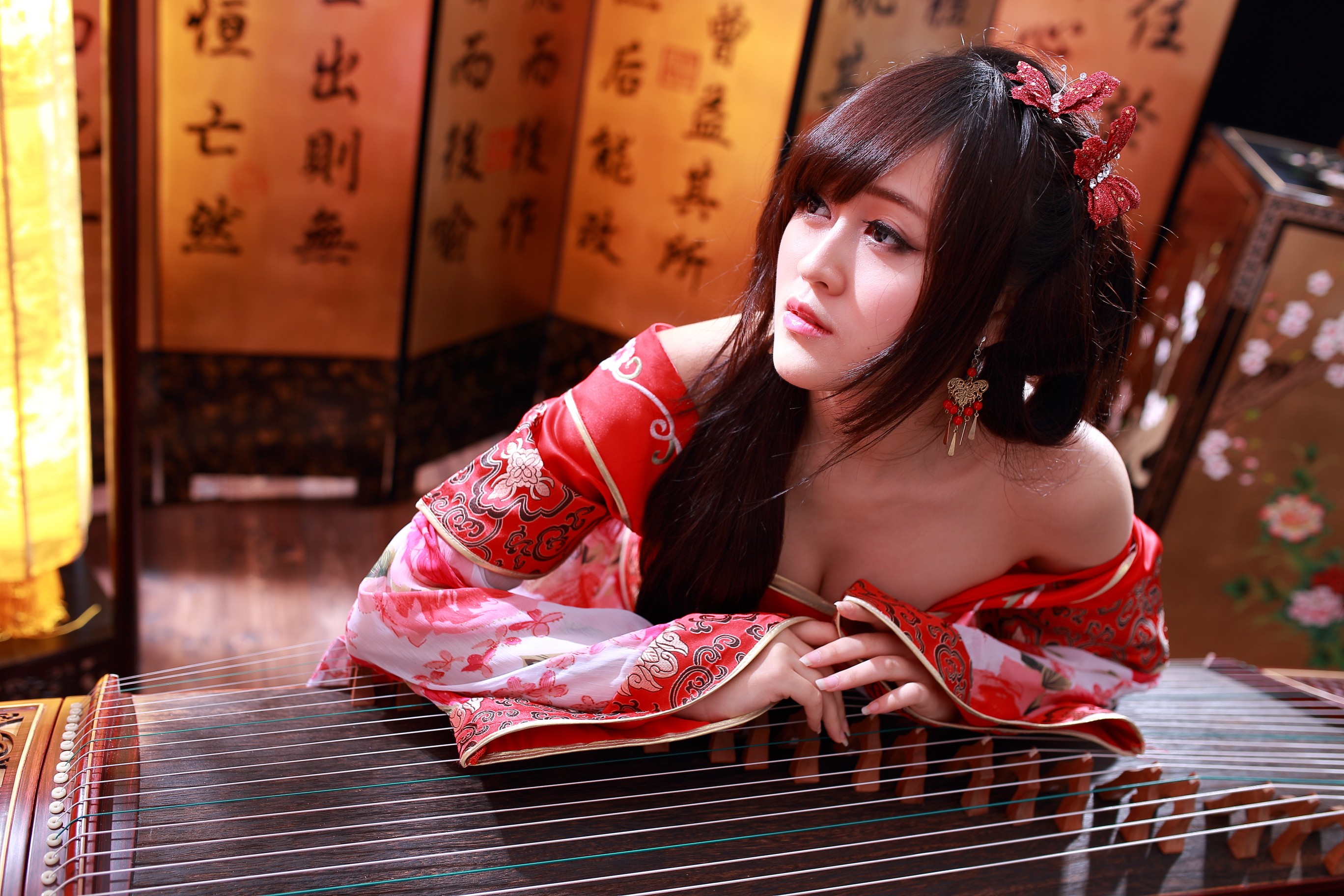 People 2736x1824 redhead auburn hair gray eyes looking away twintails Chinese dress Chinese zither guzheng women women indoors indoors model long hair long earrings musical instrument Chinese women Asian Chinese model