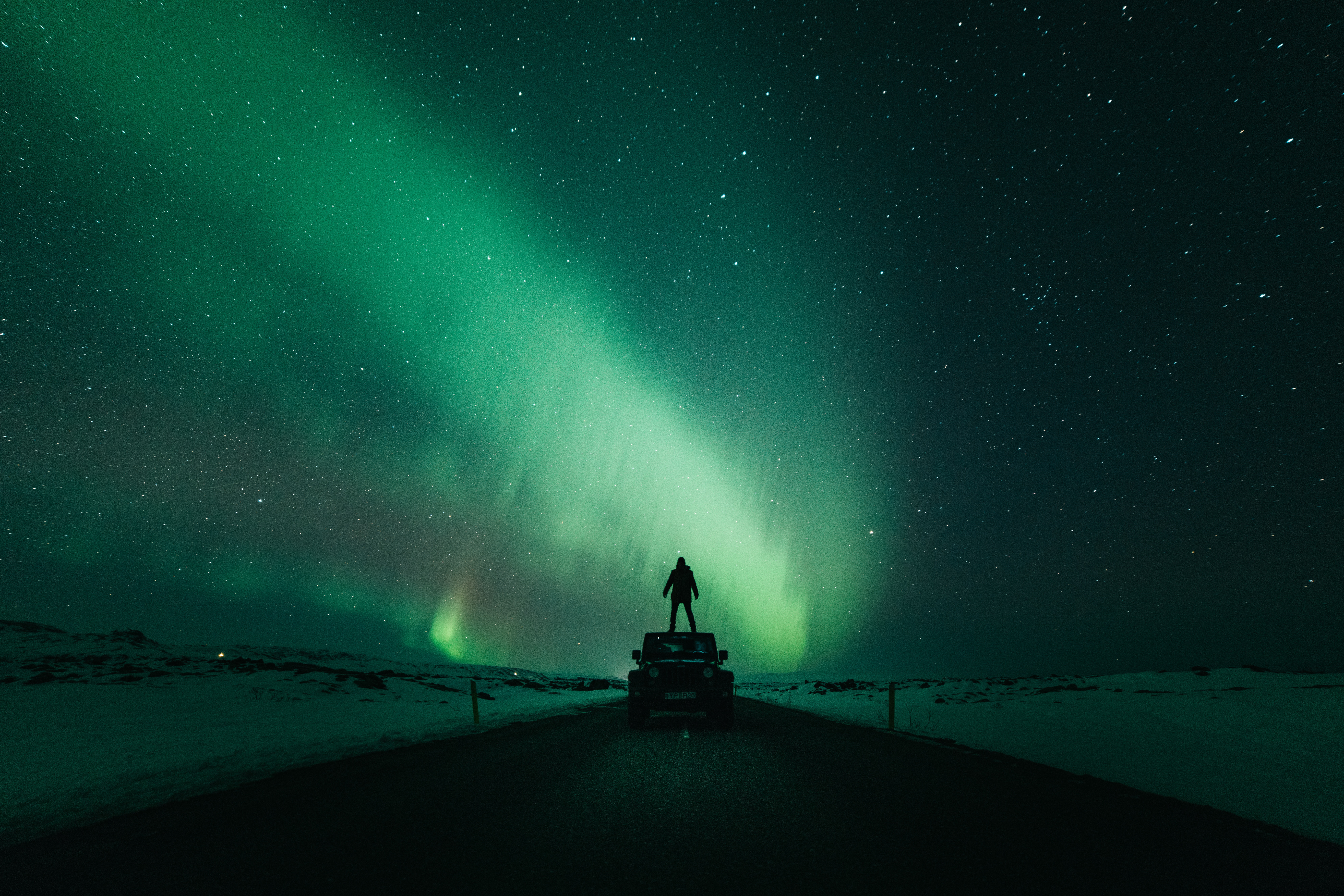 General 7952x5304 landscape aurorae night vehicle minimalism space stars highway photography alone desert nature environment green car Jeep sky snow road Kristopher Roller men solice