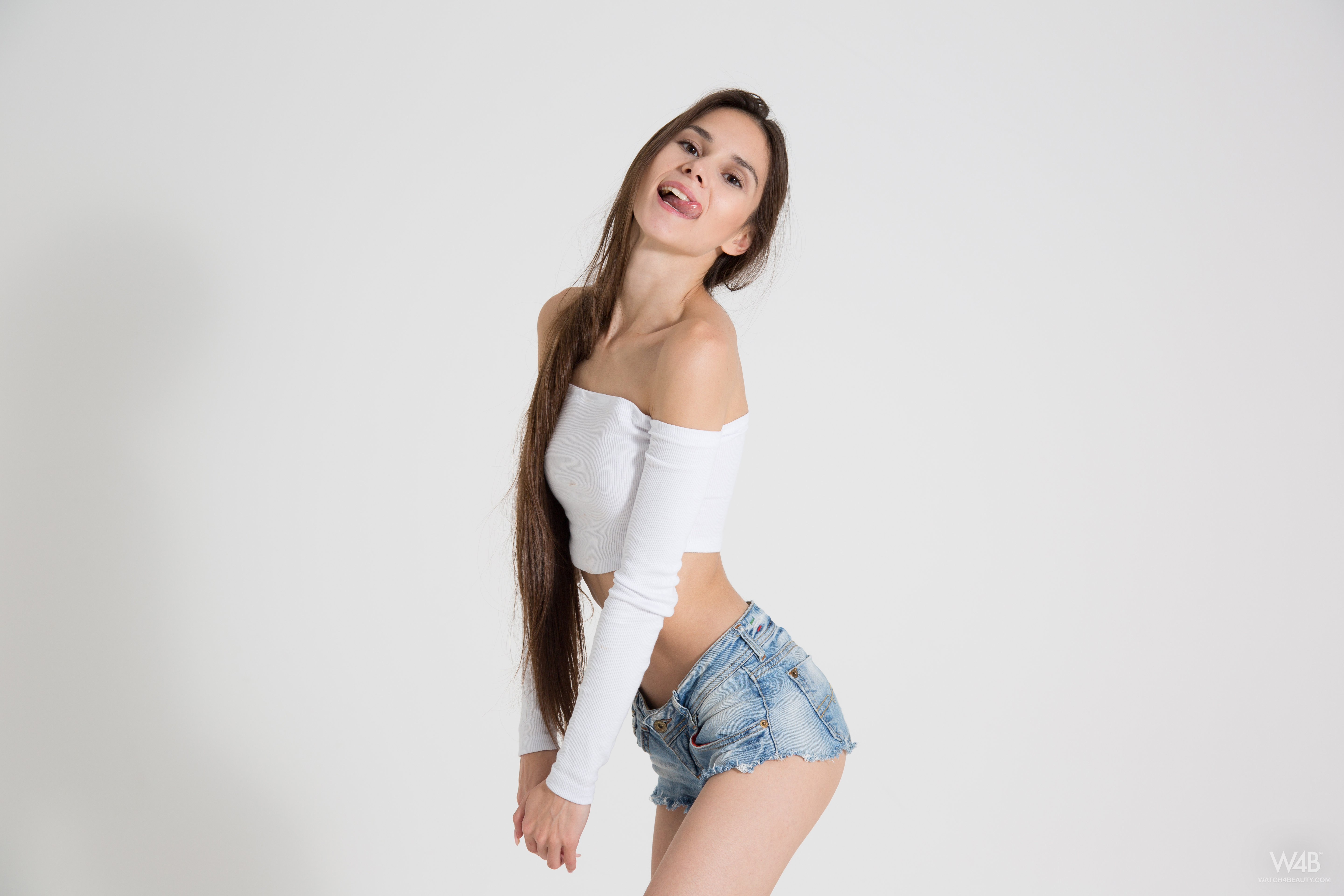 People 5760x3840 women brunette long hair white background blouses shorts brown eyes Watch4Beauty Leona Mia tongue out jean shorts skinny short shorts watermarked simple background