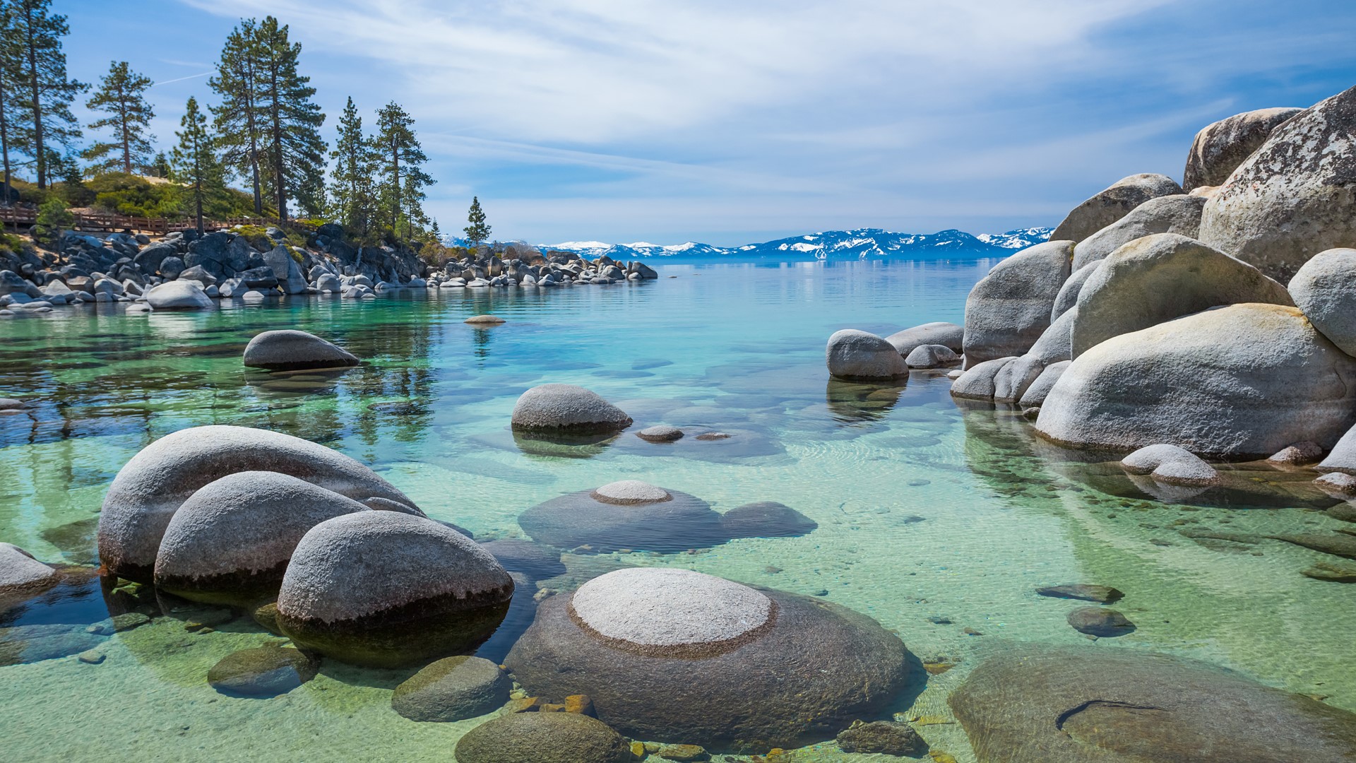 General 1920x1080 nature landscape lake trees rocks clear water water ripples mountains clouds sky snowy mountain Lake Tahoe Nevada USA