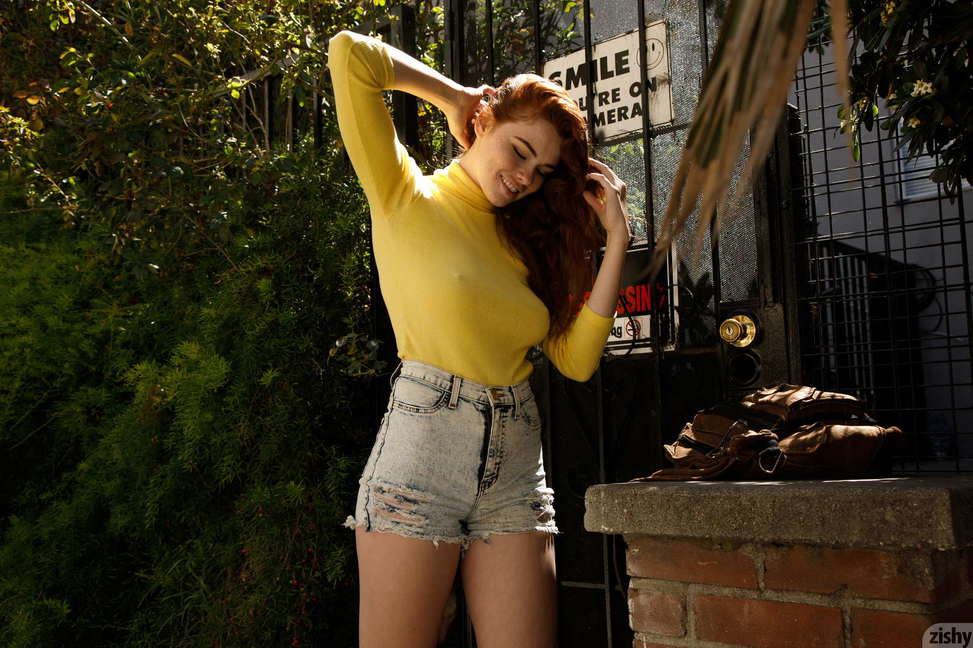 People 1920x1280 Sabrina Lynn redhead Zishy model women sunlight women outdoors high waisted shorts smiling hands in hair jean shorts nipples through clothing arms up closed eyes