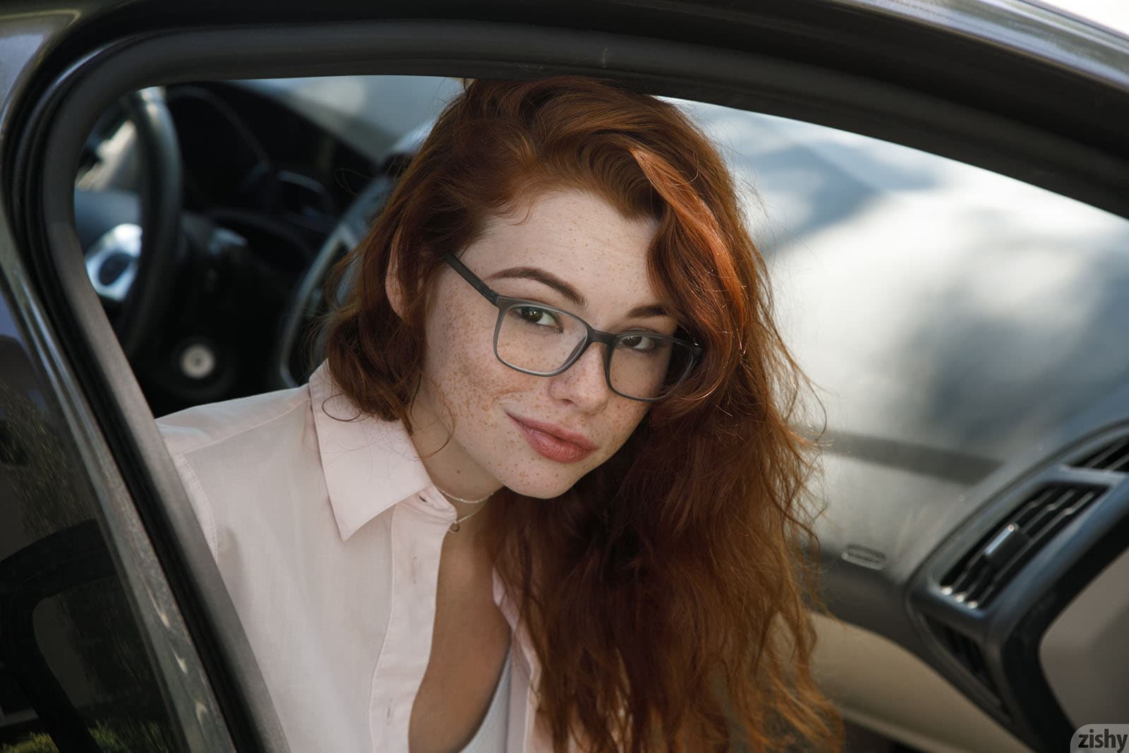 People 1600x1067 Sabrina Lynn face redhead car Zishy glasses women with glasses smiling long hair looking at viewer vehicle car interior women model freckles