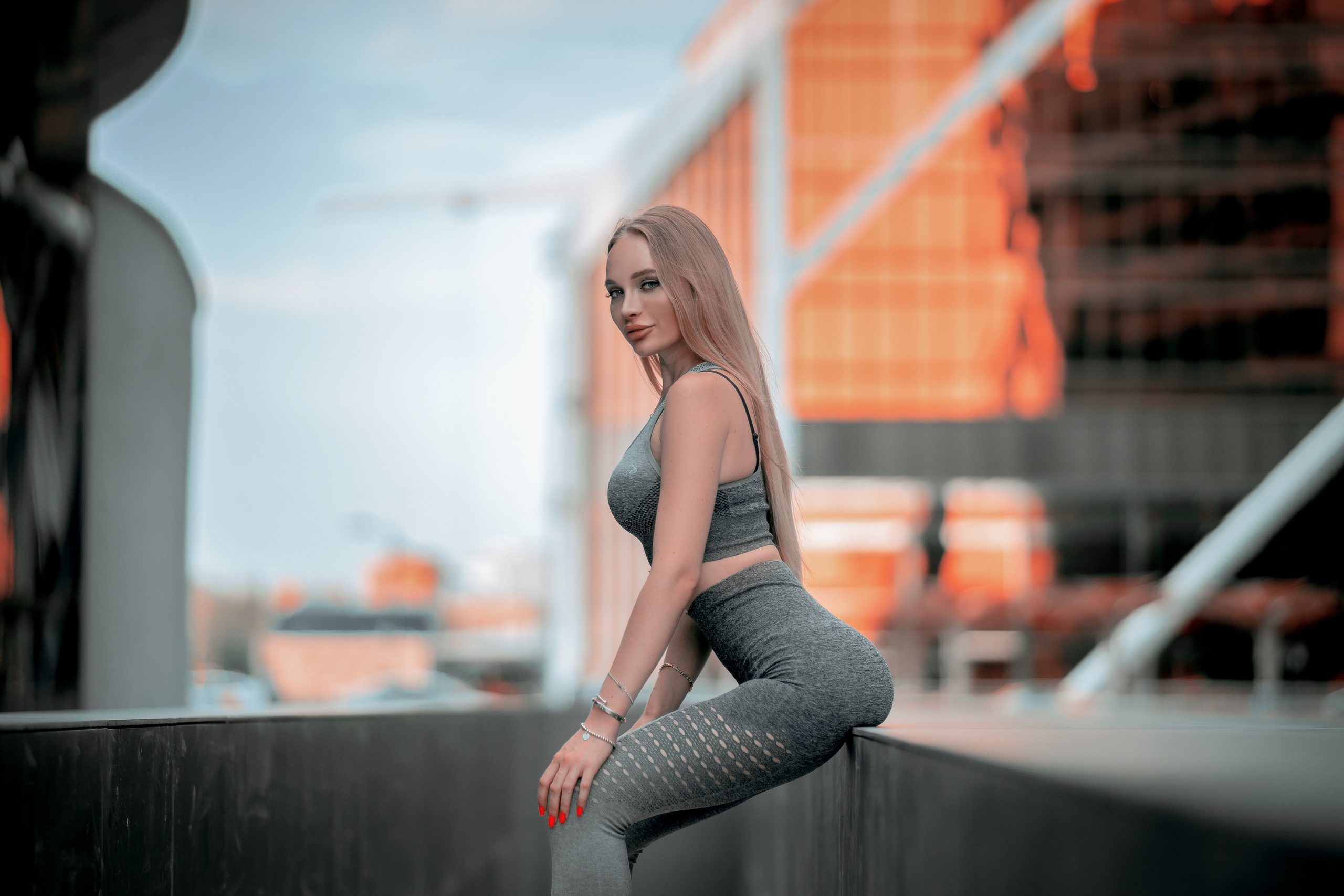 People 2560x1707 women sportswear long hair women outdoors red nails blonde building looking at viewer high waisted leggings
